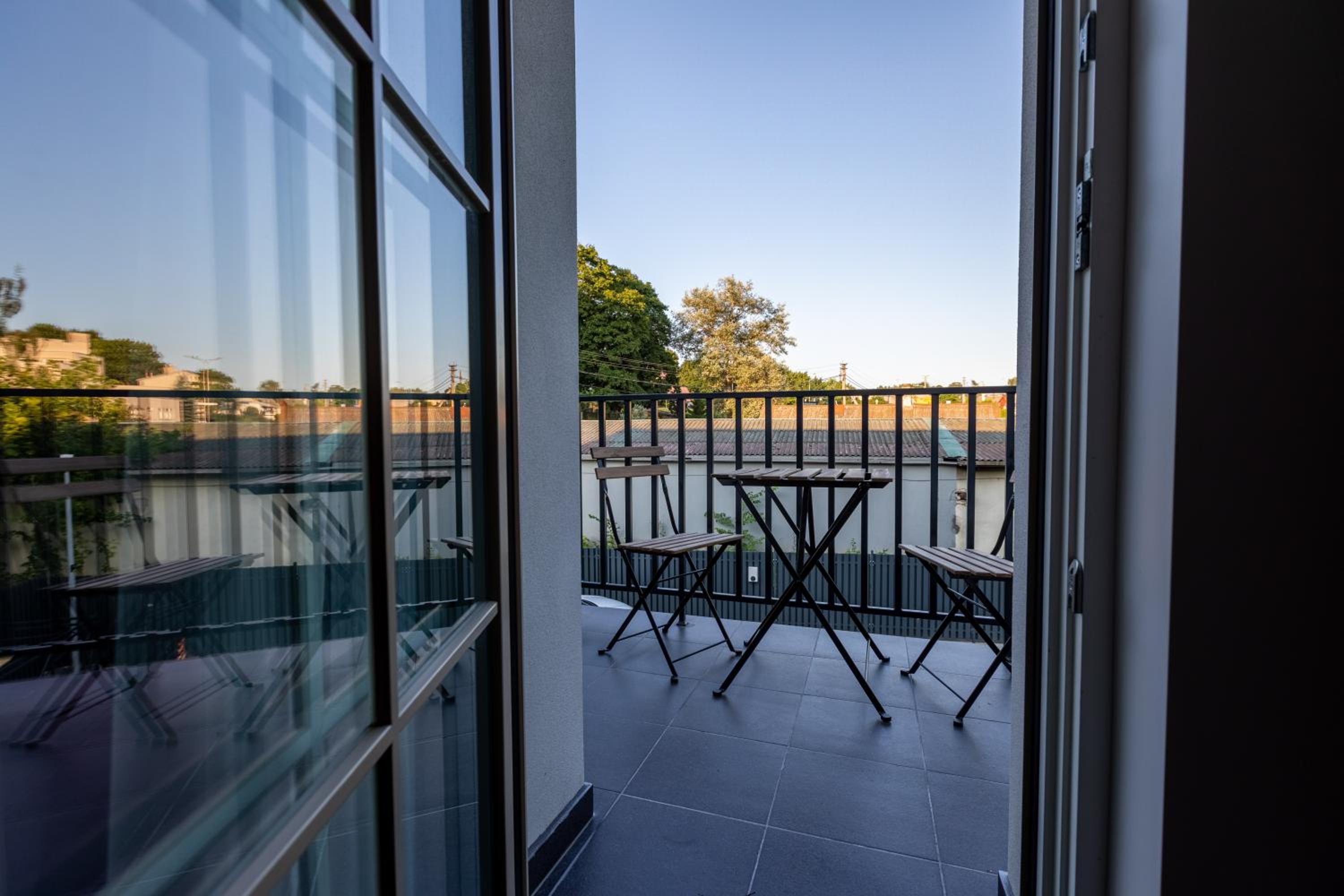 Quadruple Room with Balcony - Photo 13