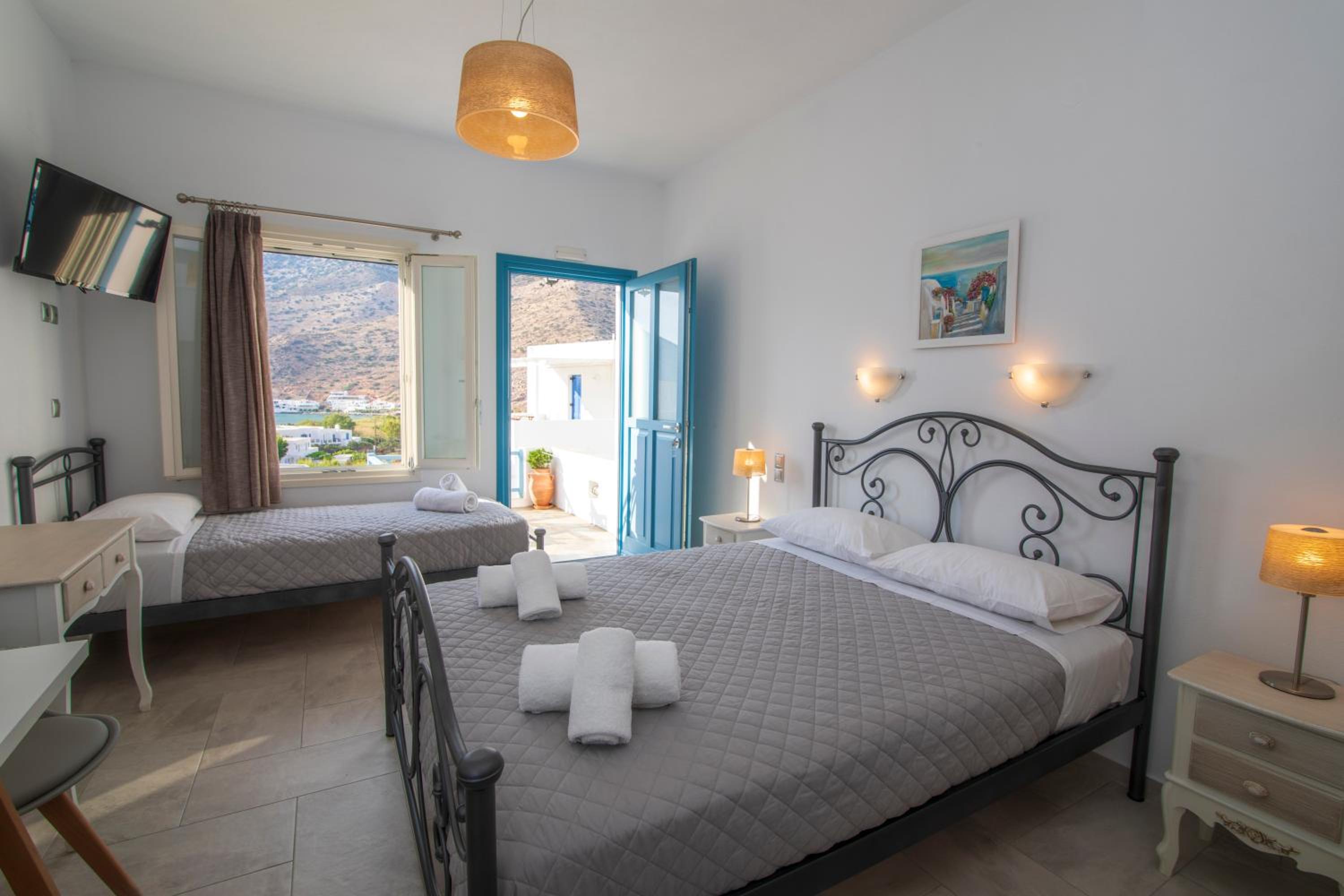 Quarto Triplo com Vista para o Mar