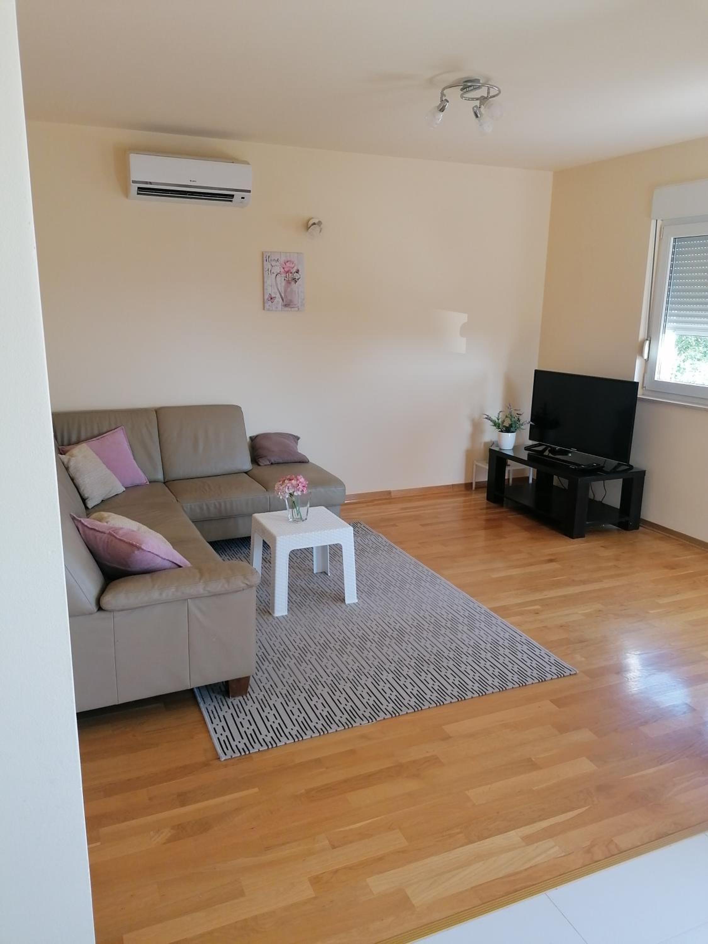 Three-Bedroom Apartment - Photo 11