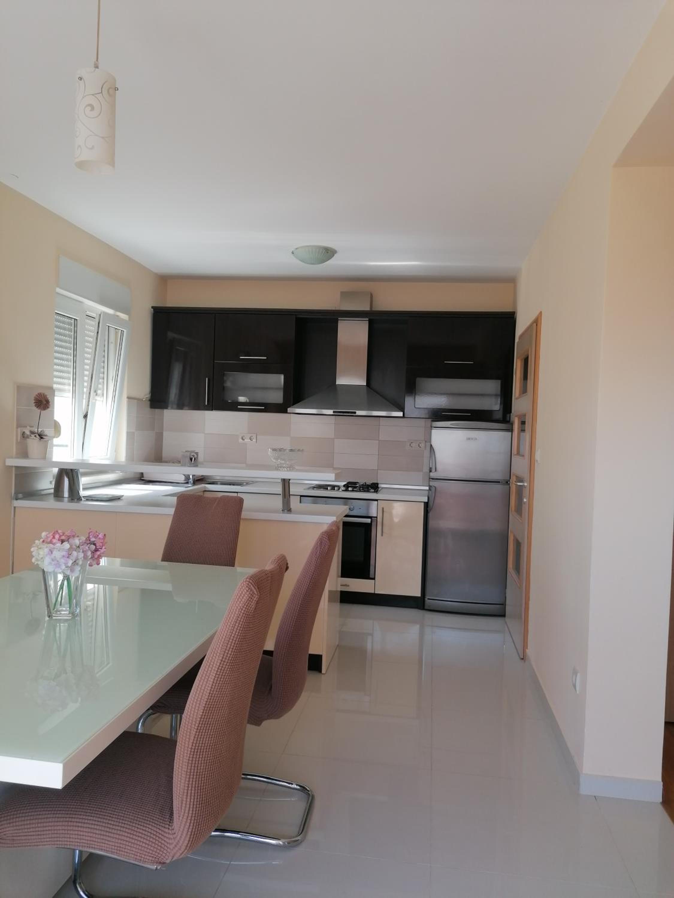 Three-Bedroom Apartment - Photo 19