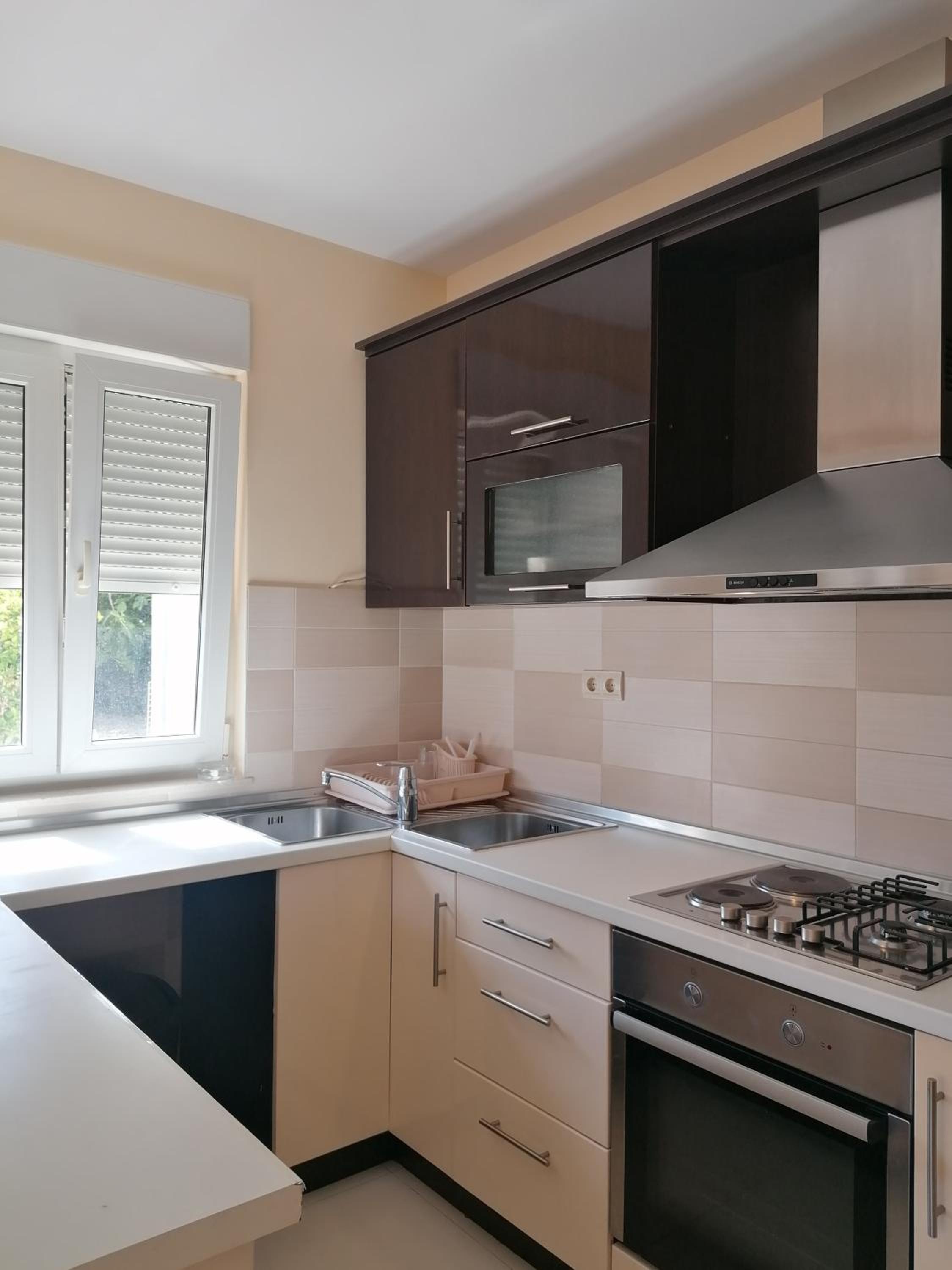 Three-Bedroom Apartment - Photo 22