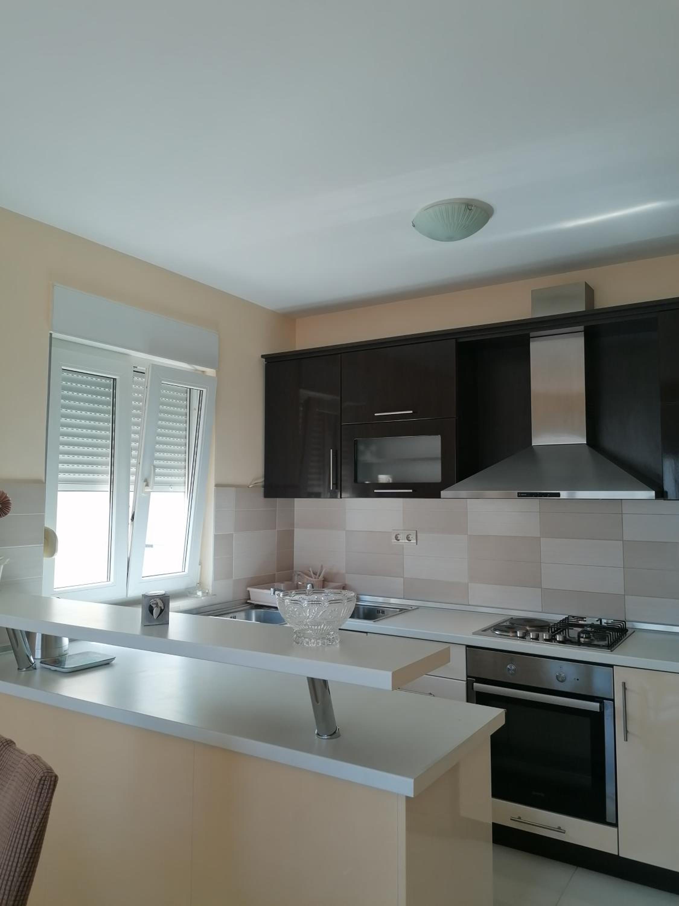 Three-Bedroom Apartment - Photo 2