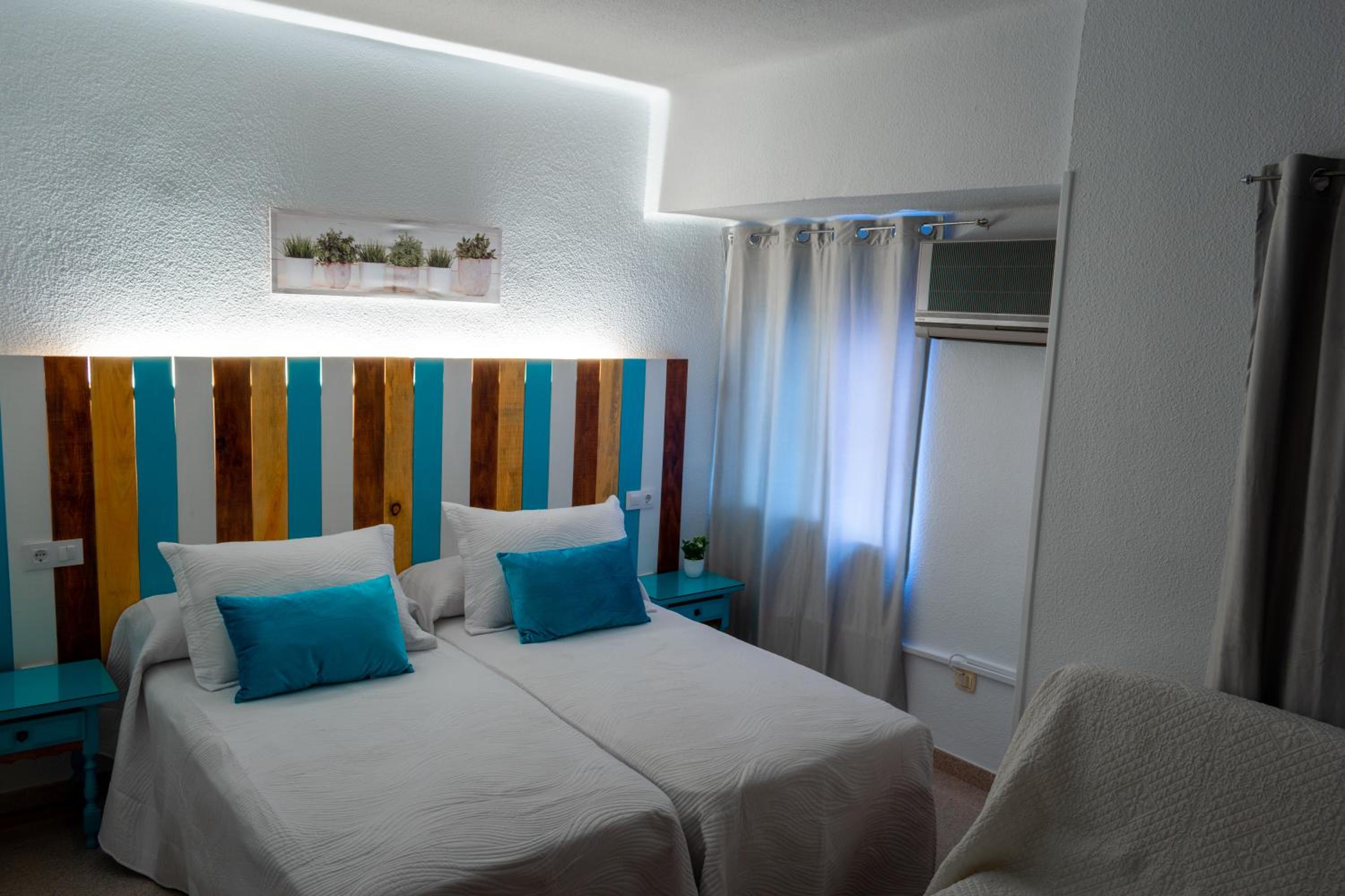 Doble con cama extra