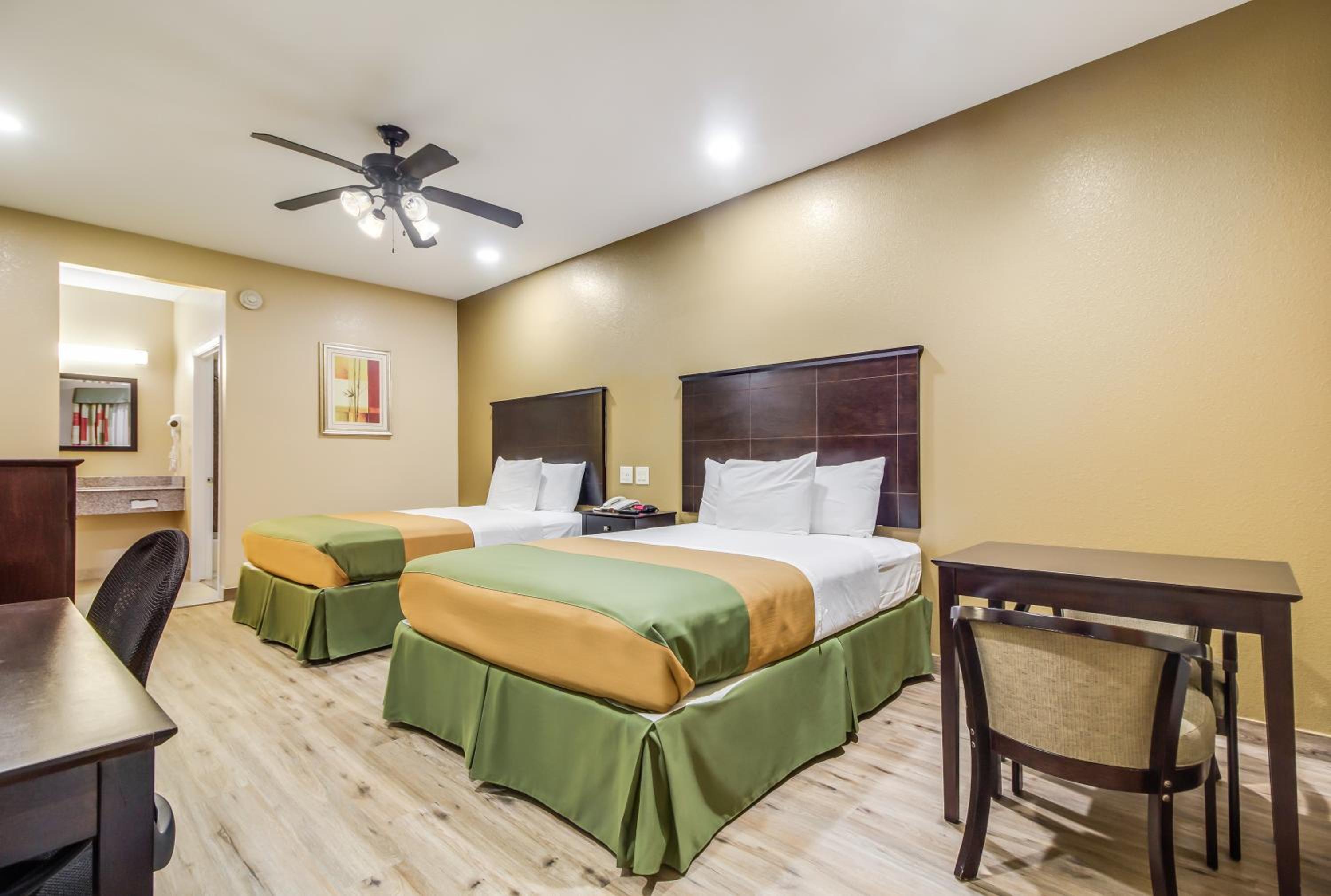 Queen Room with Two Queen Beds - Photo 1