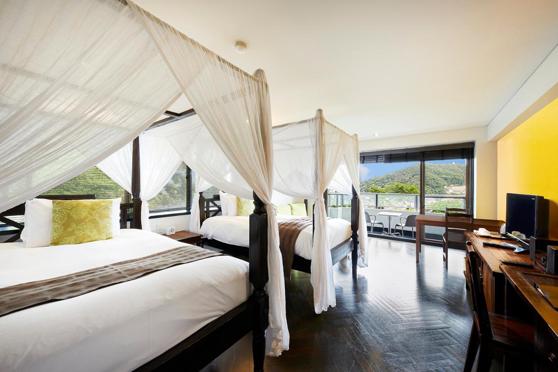 Superior Corner Twin Room with Balcony