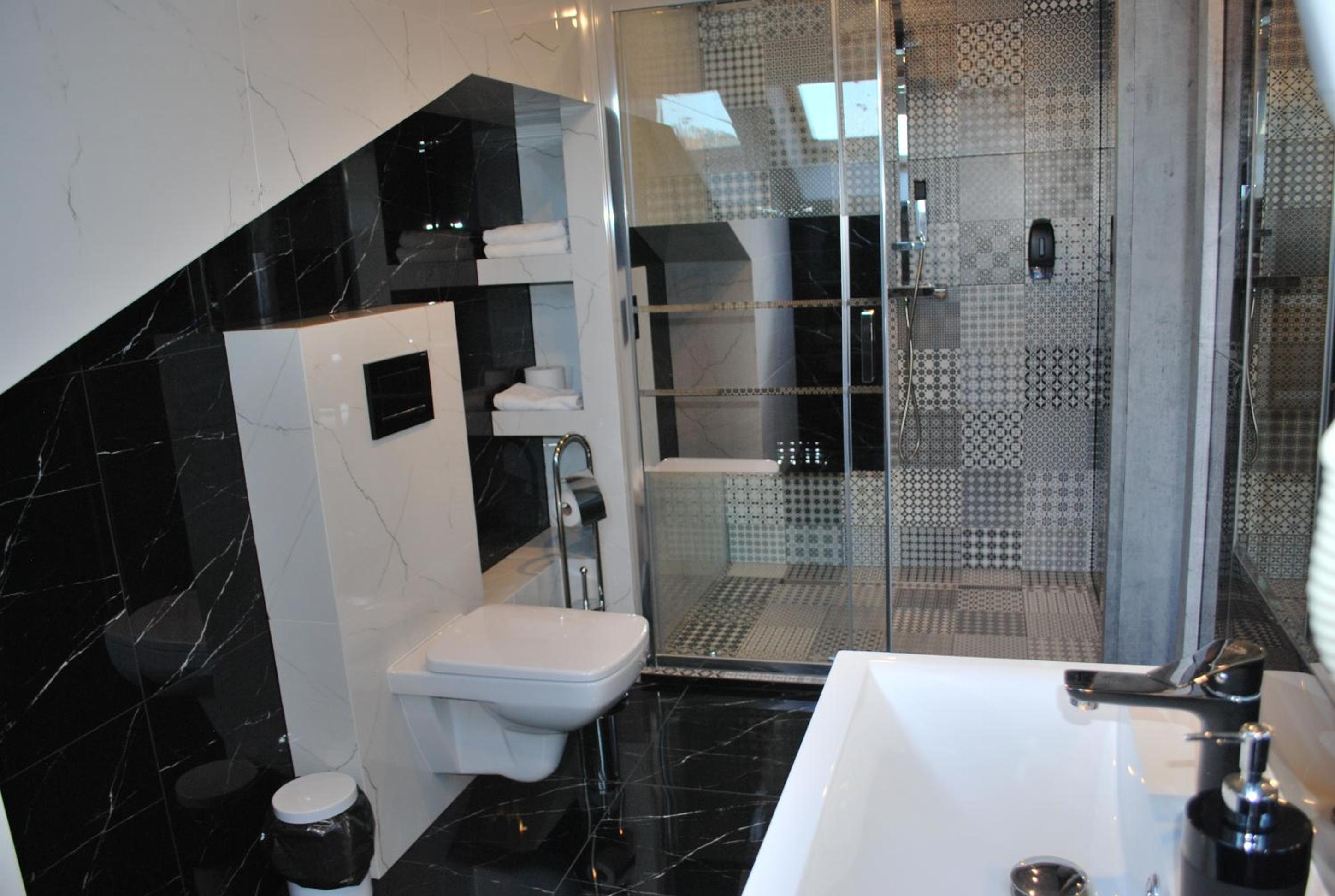 Deluxe Quadruple Room - Photo 7