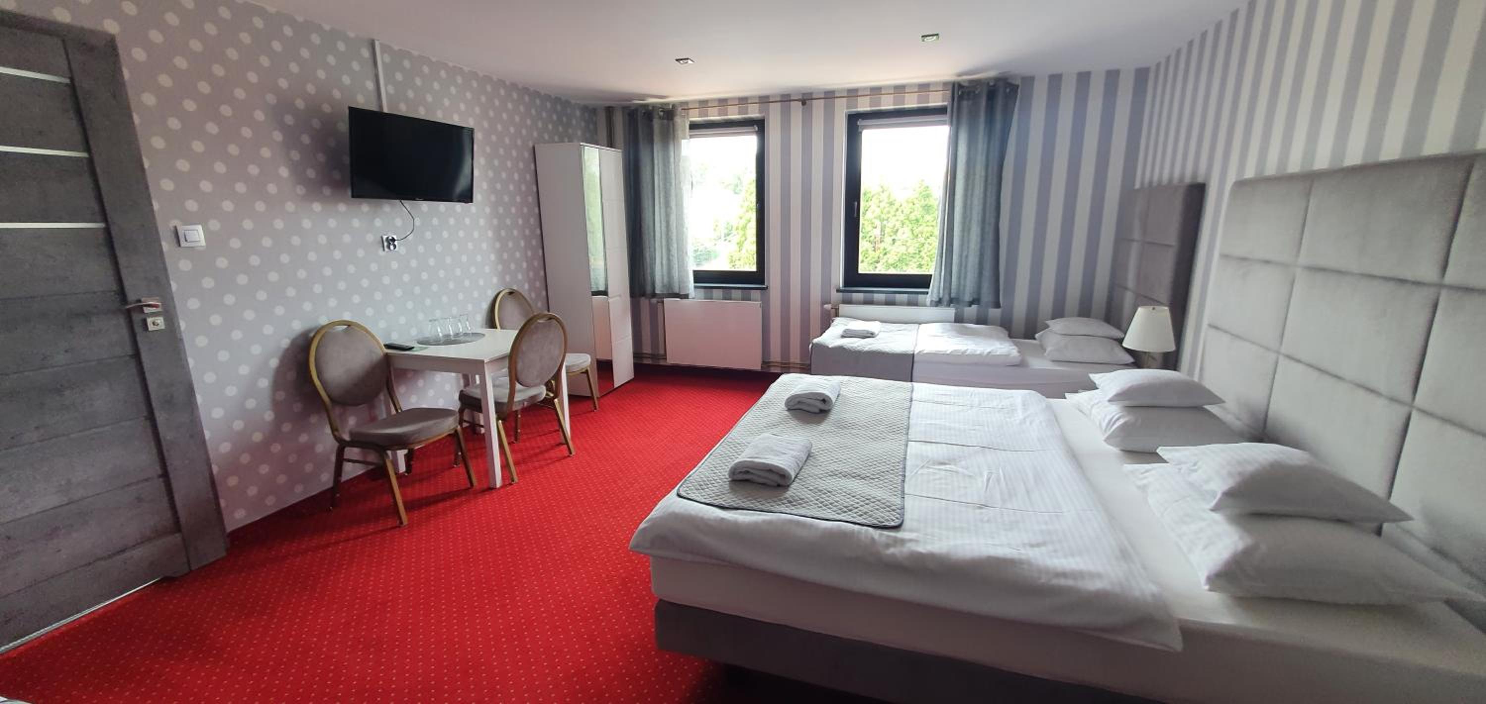 Deluxe Quadruple Room - Photo 12