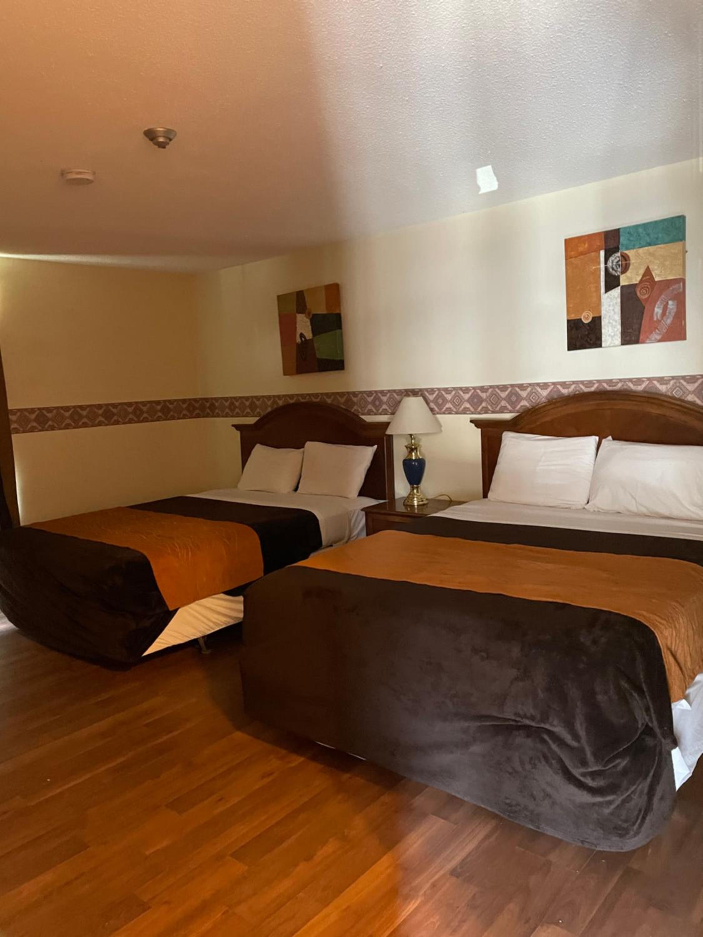 Standard Queen Room with Two Queen Beds - Photo 1