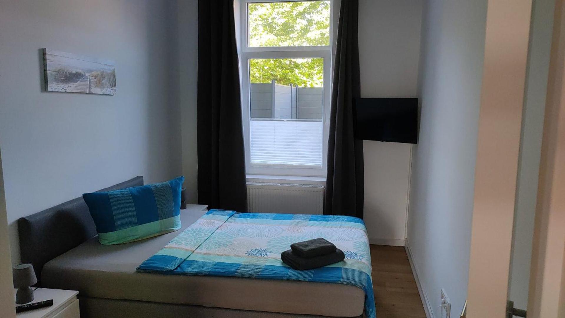 Three-Bedroom Apartment - Photo 4