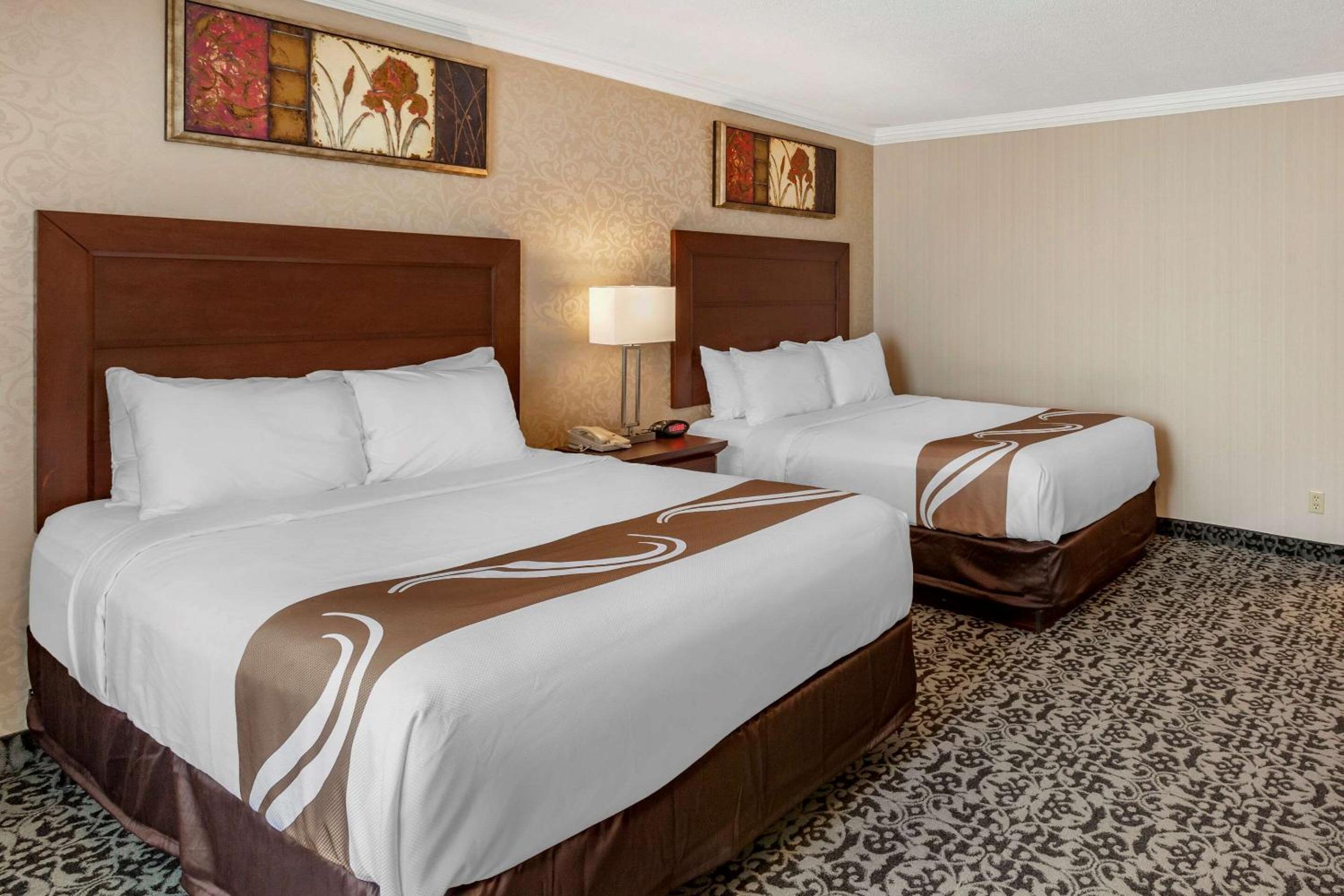 Queen Room with Two Queen Beds - Non-Smoking - Photo 1