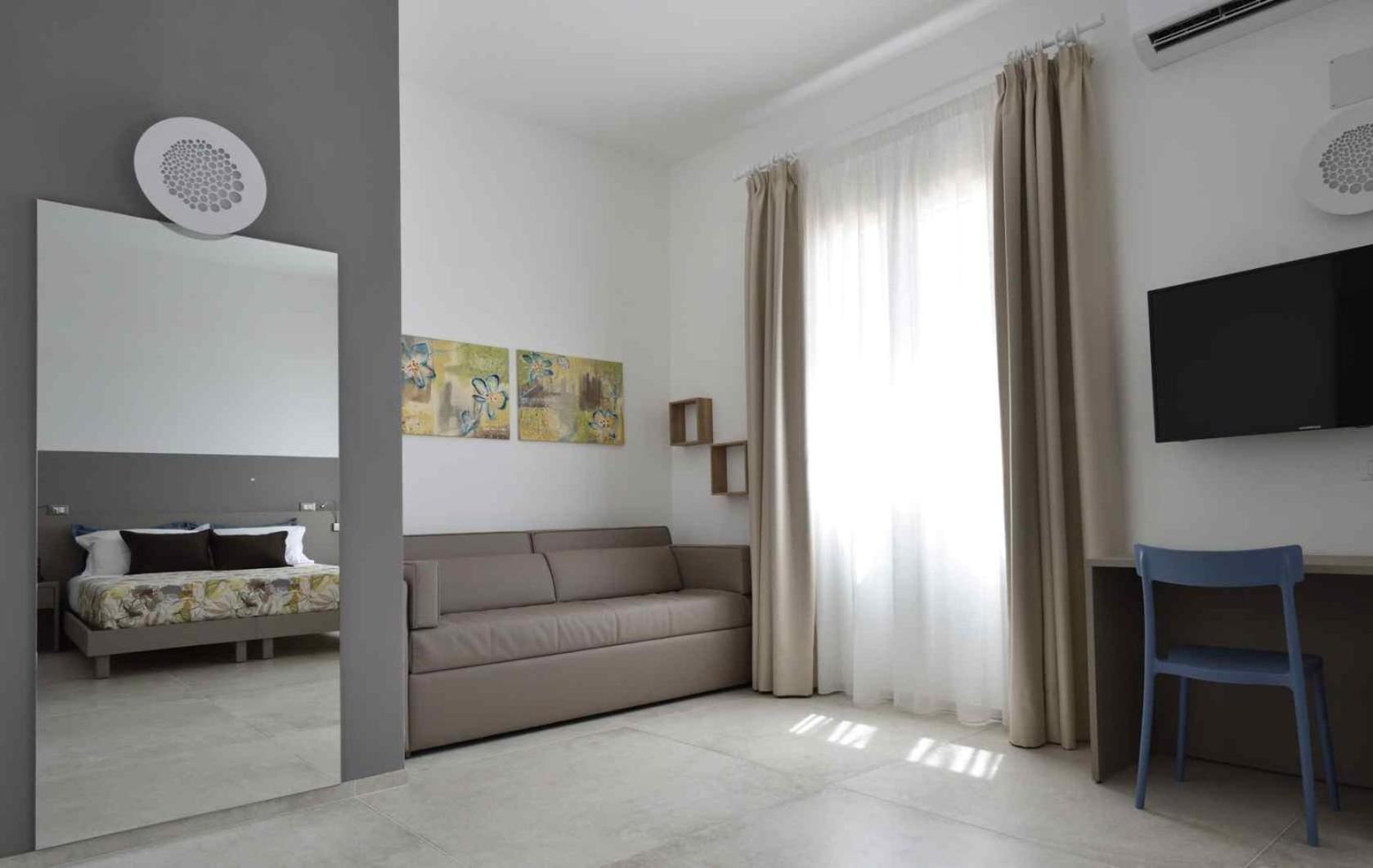 Quadruple Room with Private Bathroom photo 1