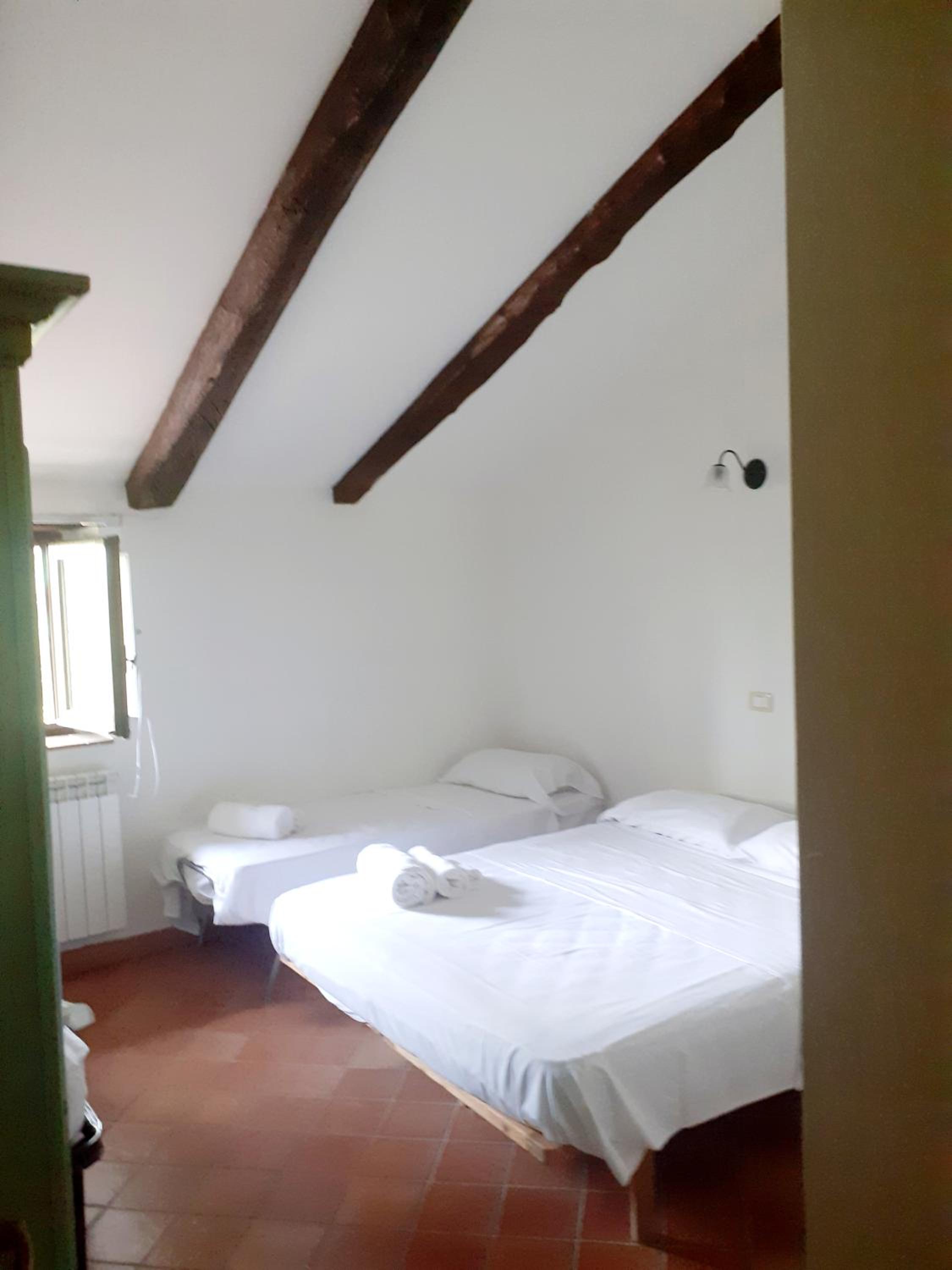Quadruple Room with Private Bathroom photo 1