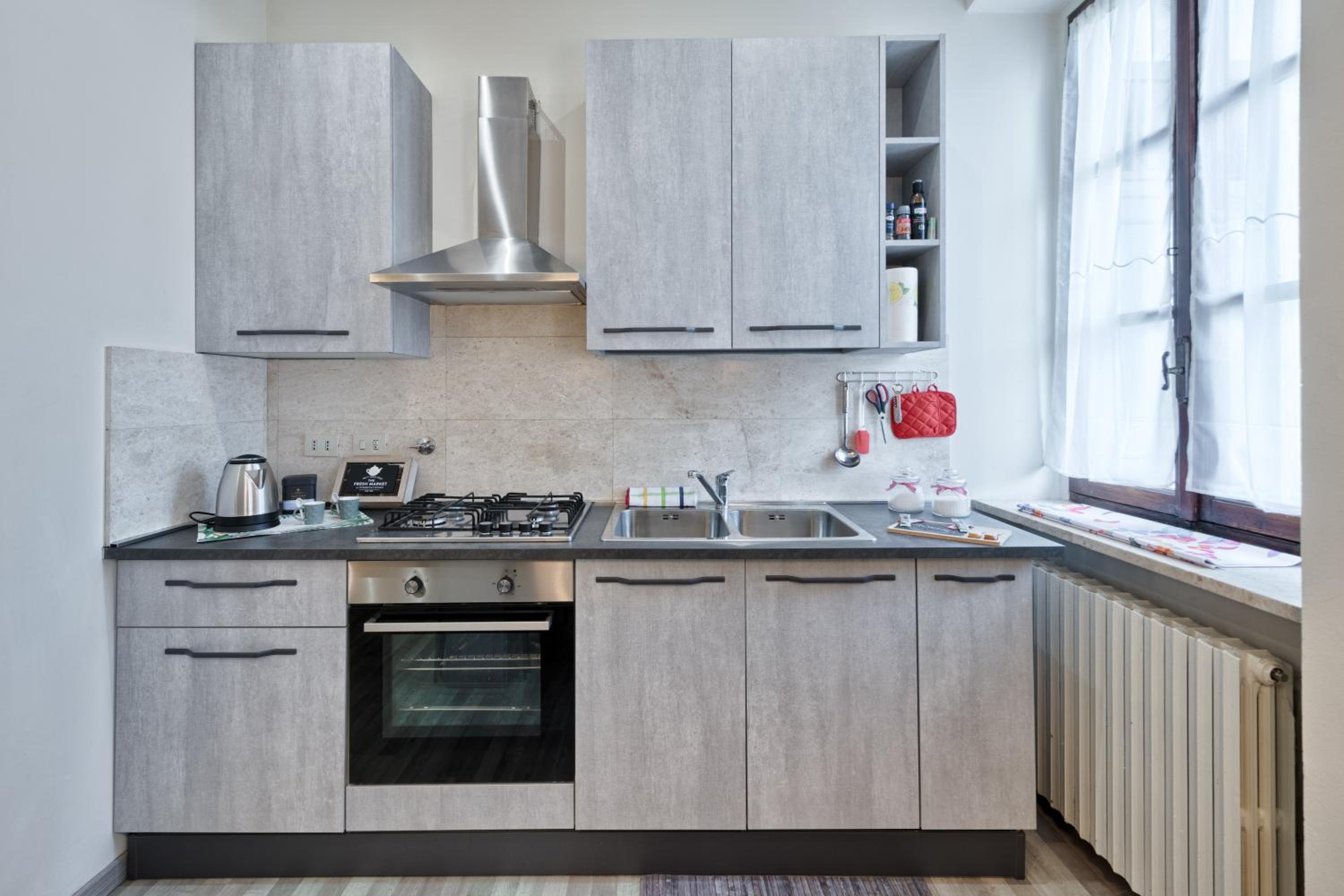 Three-Bedroom Apartment - Photo 40
