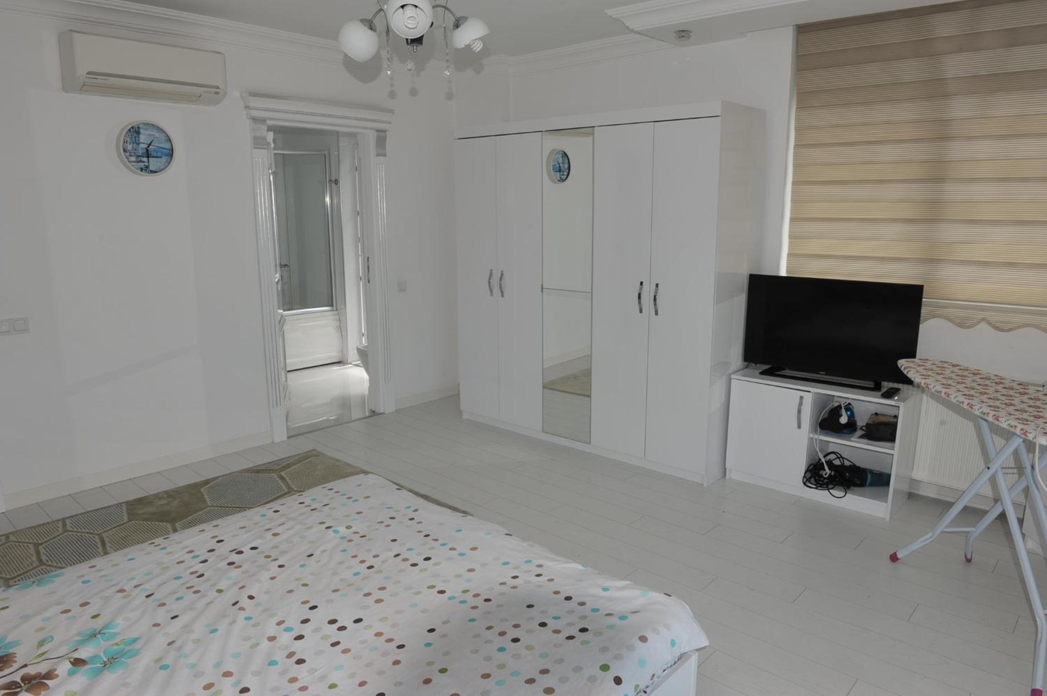 Three-Bedroom Apartment photo 1