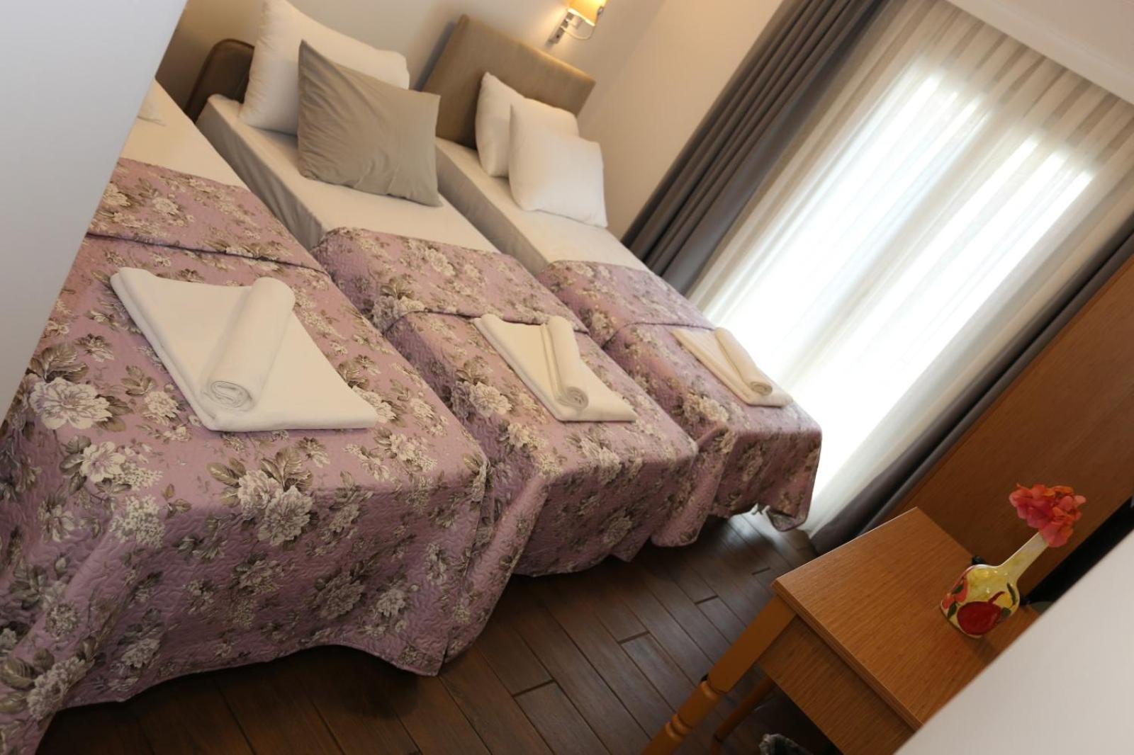 Triple Room - Photo 10