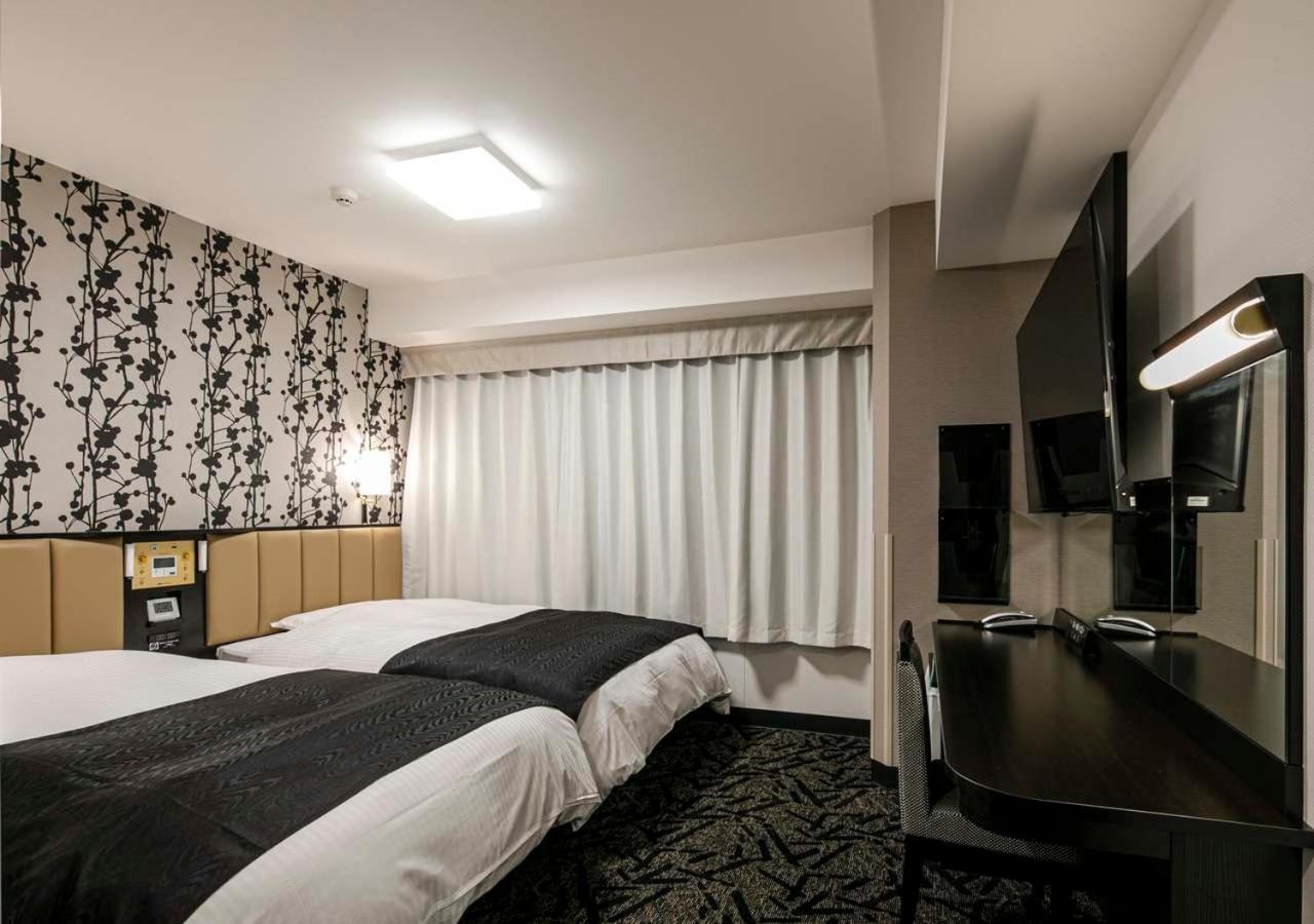 Twin Room - Photo 1