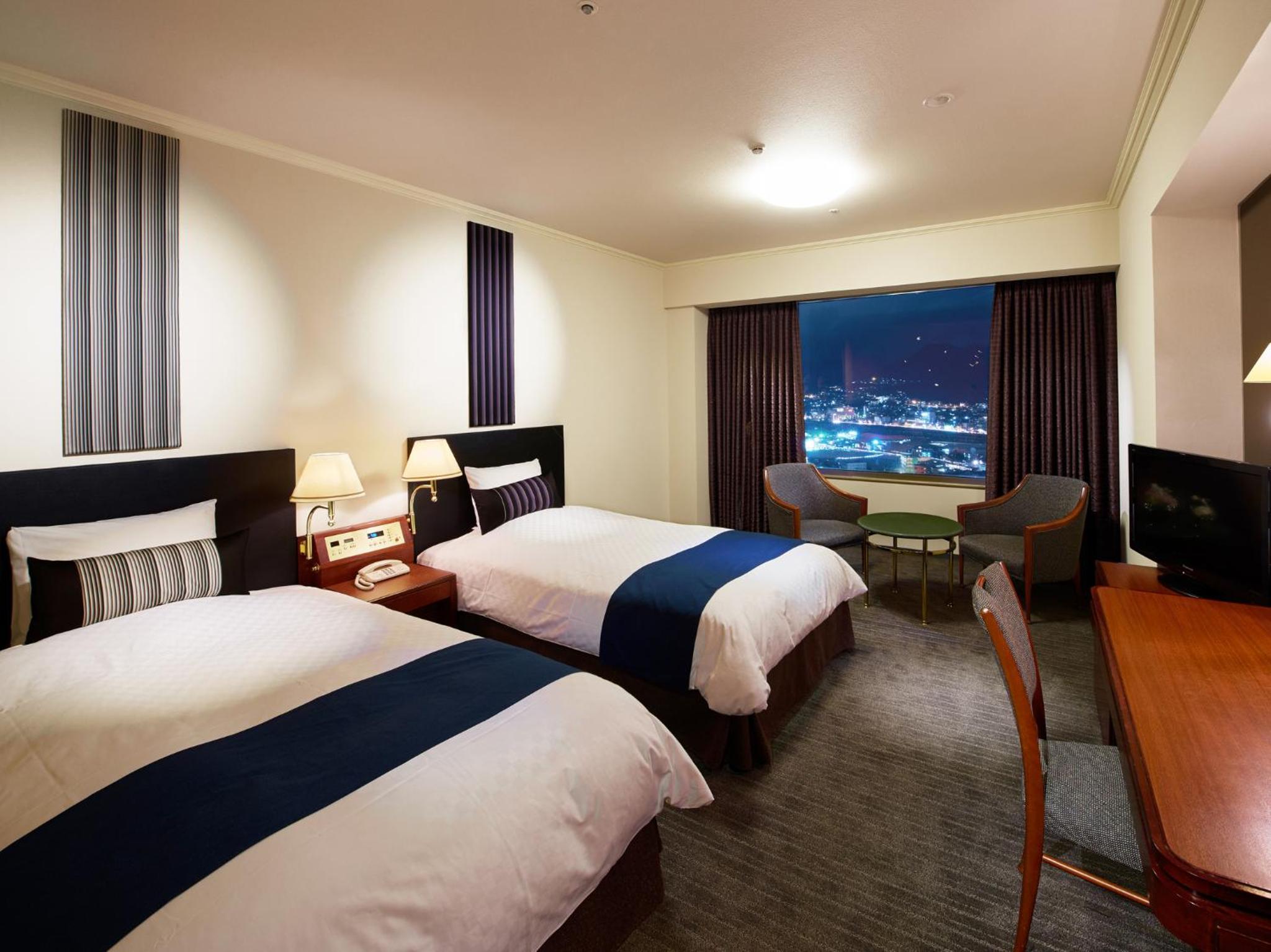  Twin Room (24th-25th Superior Floor) - Non-Smoking - Photo 1