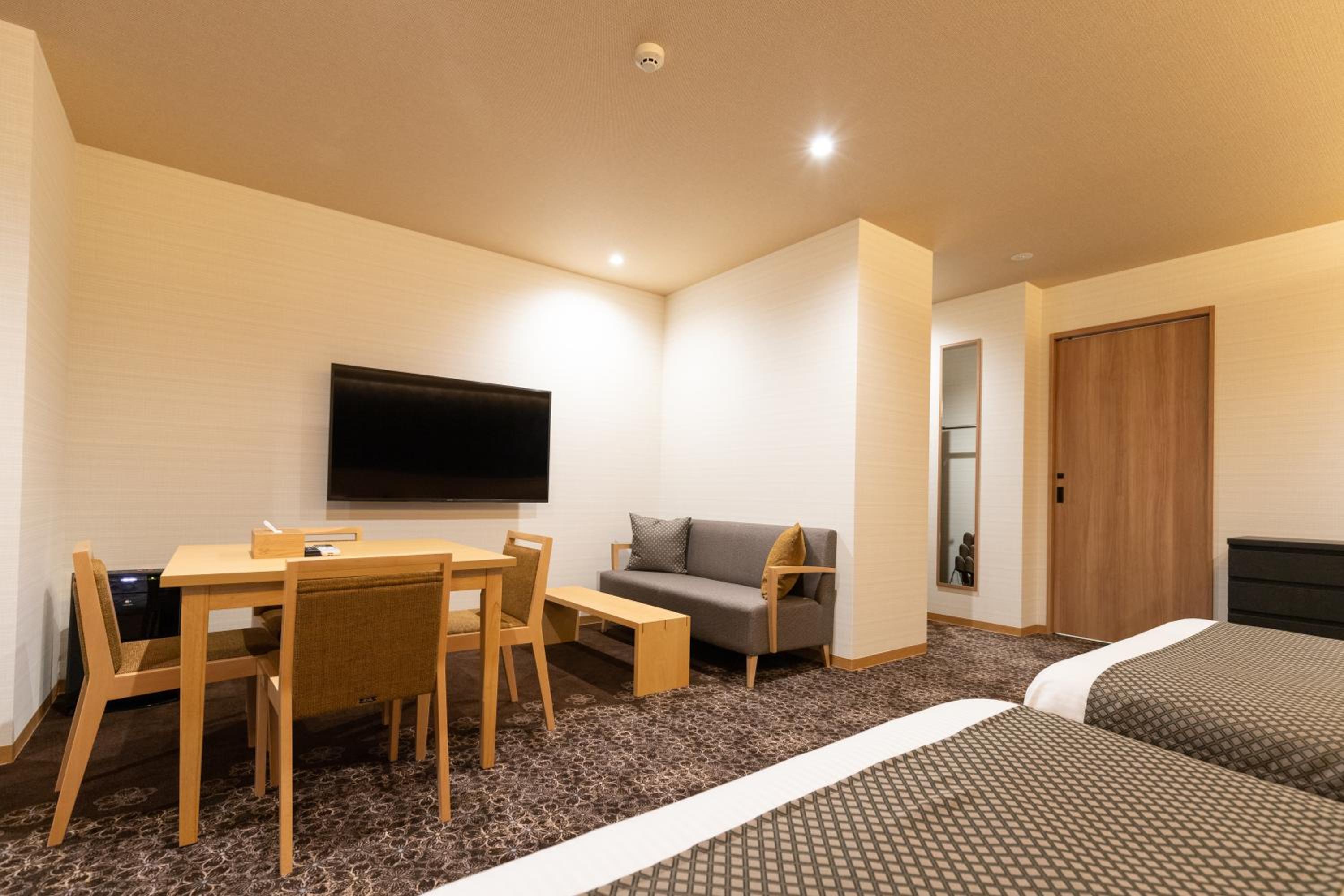 Deluxe Triple Room - Photo 9