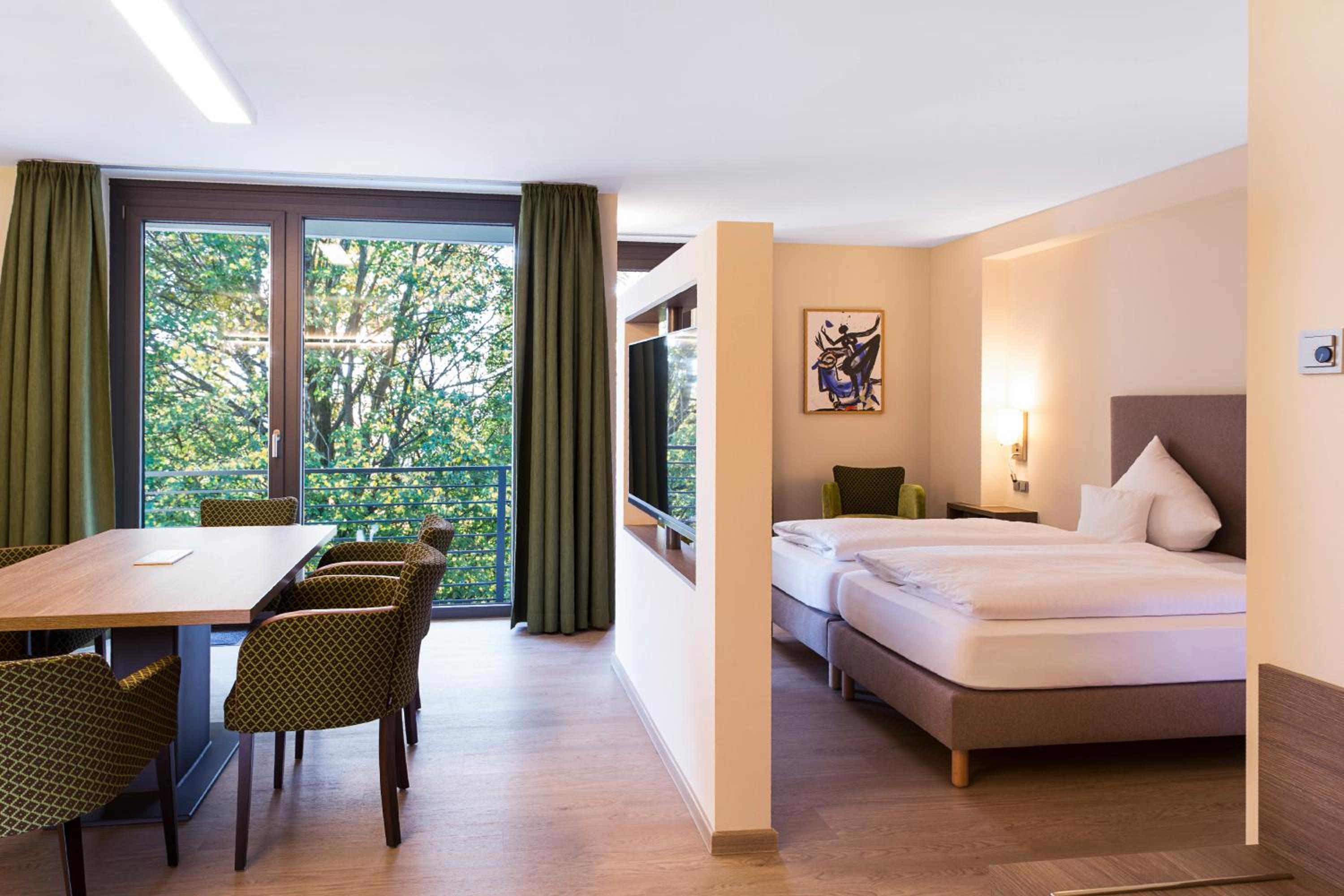 Junior Suite with Balcony - Photo 1