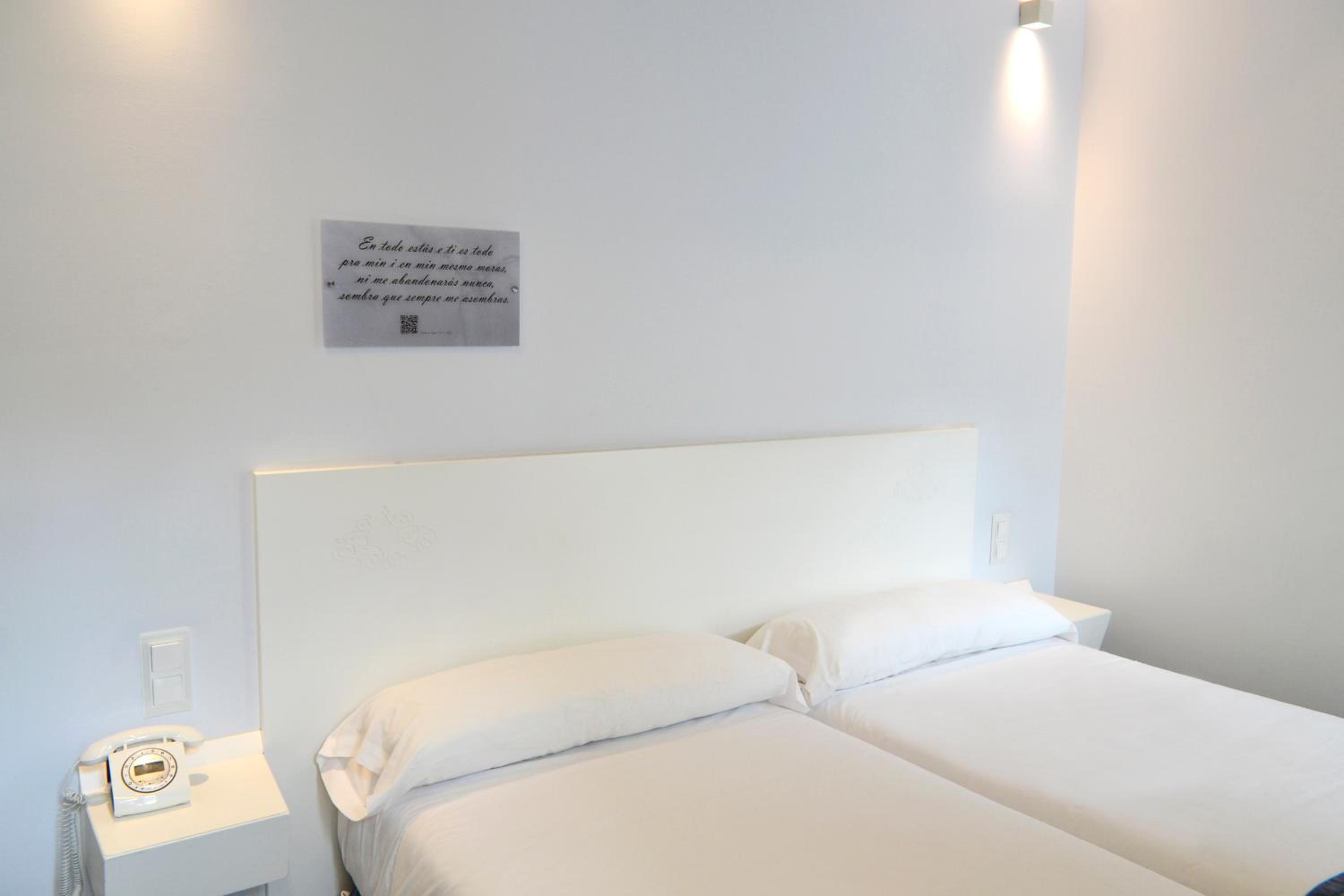 Habitación Doble Estándar o con Dos Camas Individuales.
