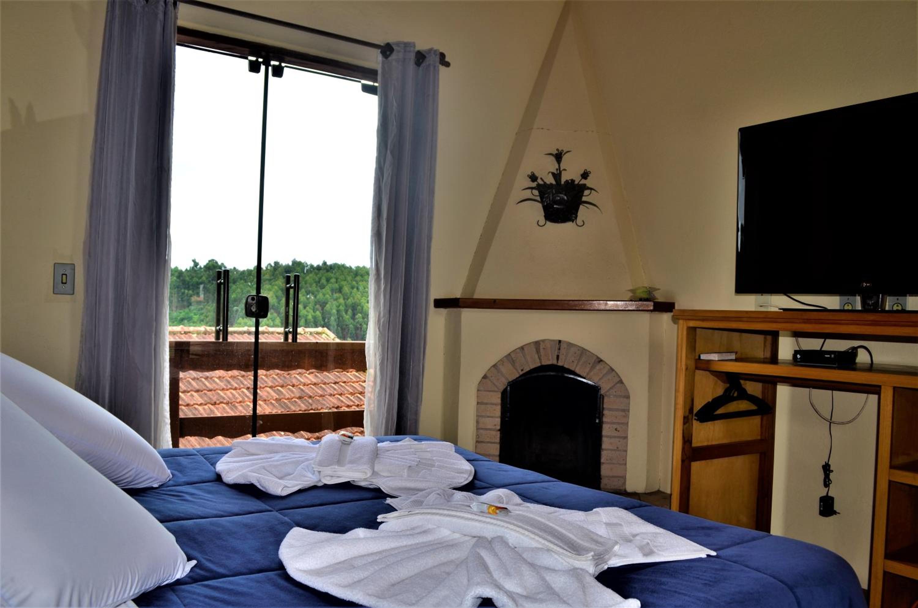 Suite with Balcony - Photo 1