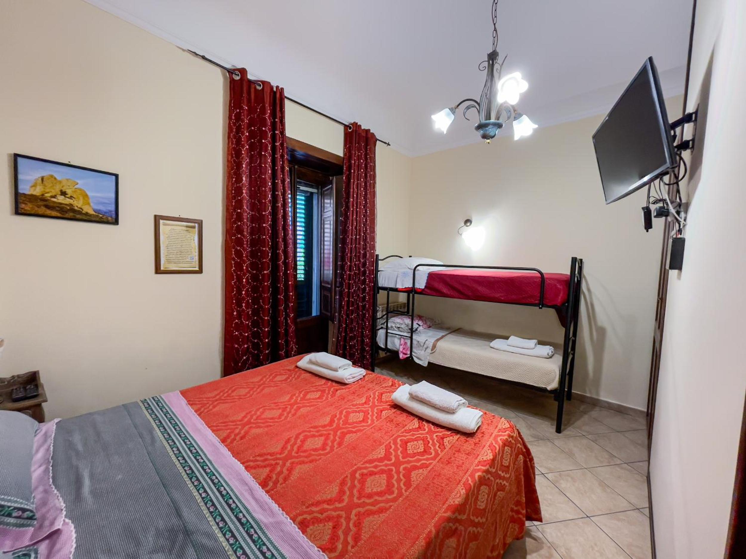 Quadruple Room - Photo 1
