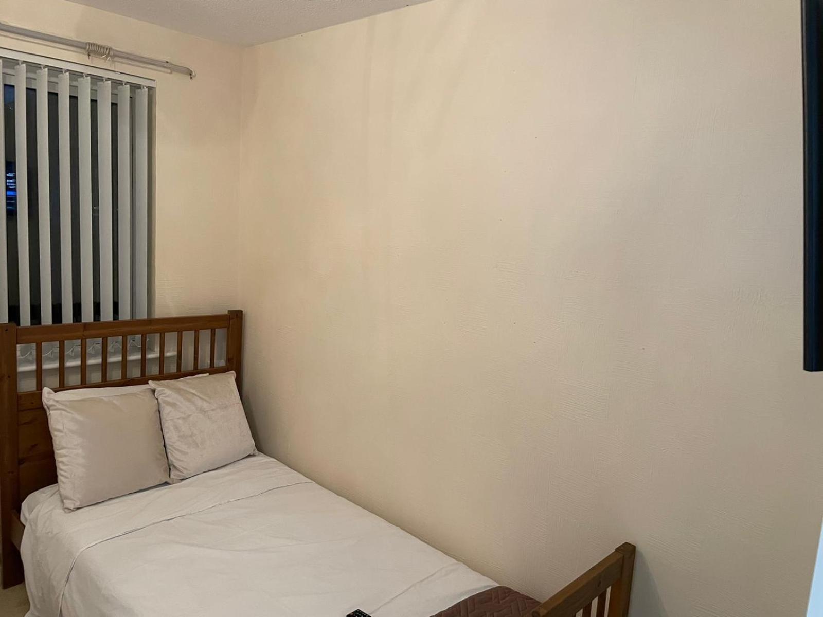 Three-Bedroom House - Photo 11