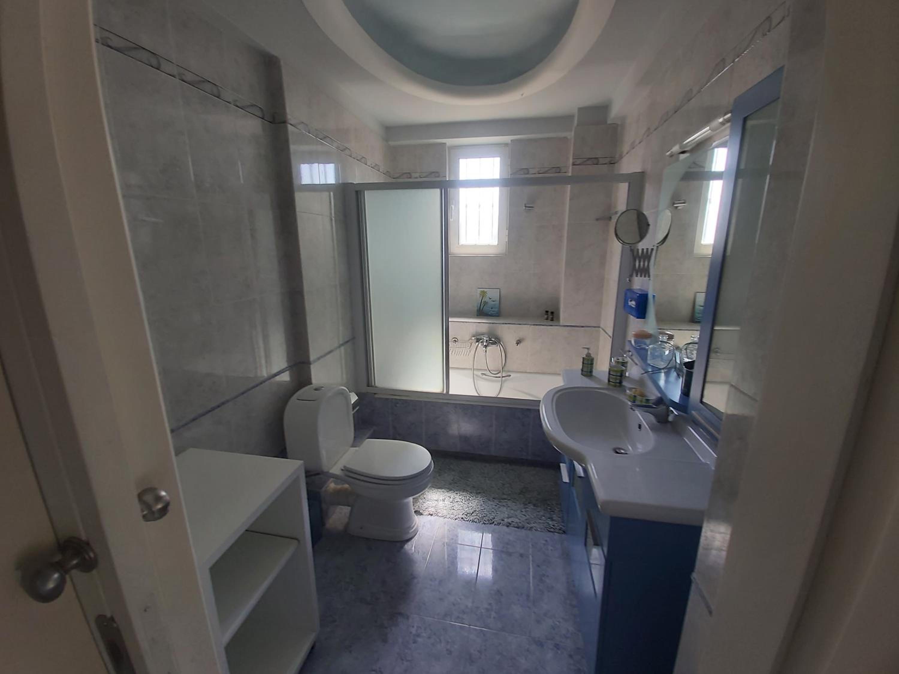 Three-Bedroom Apartment - Photo 15