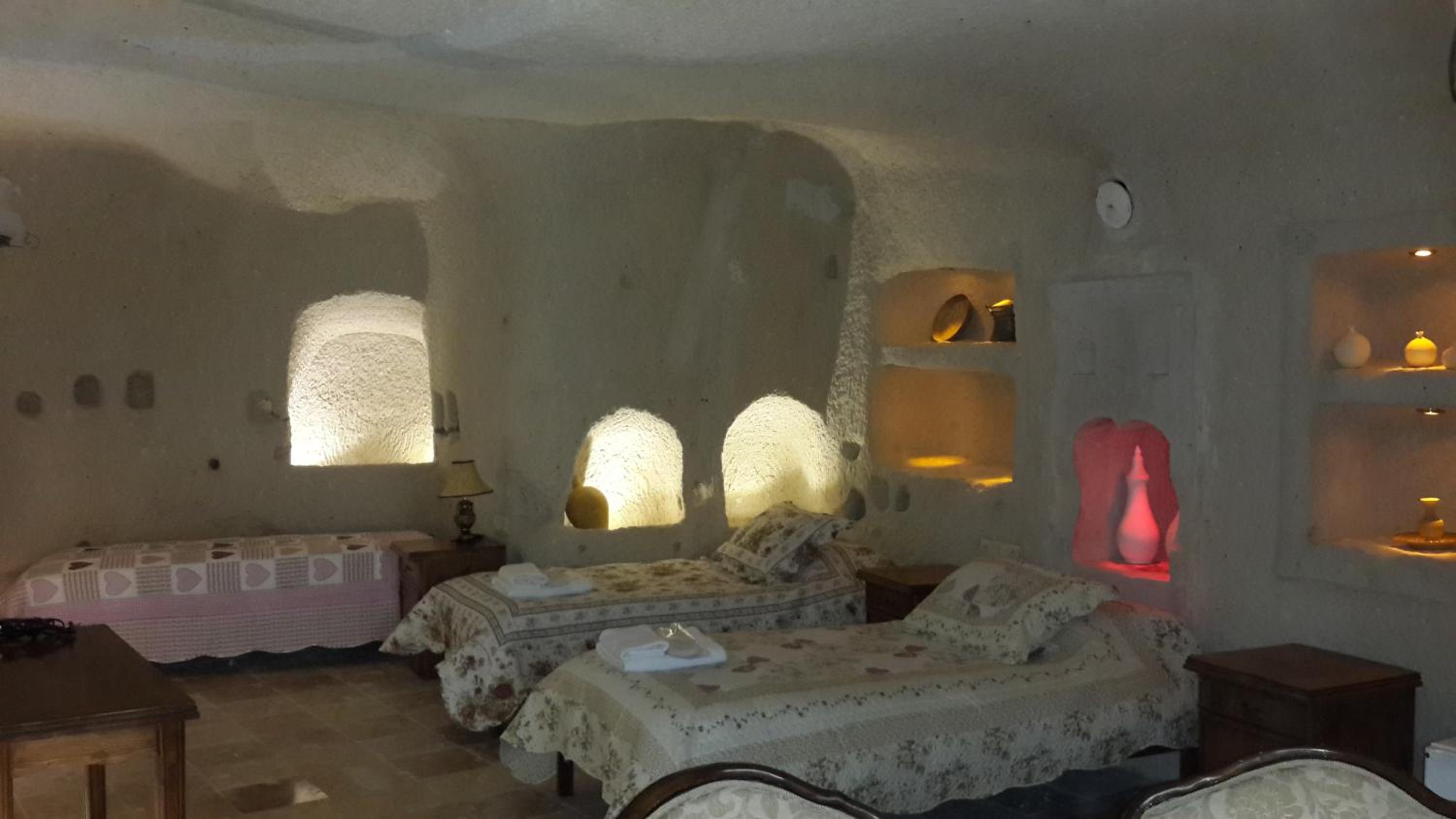 Standard Quadruple Cave Room (No Window)