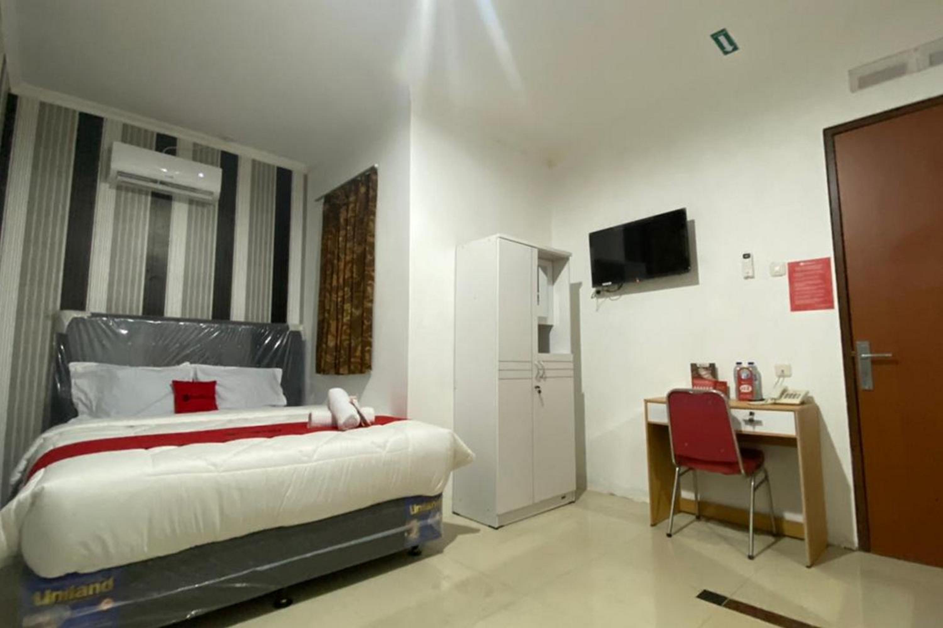 Deluxe Room - Photo 4