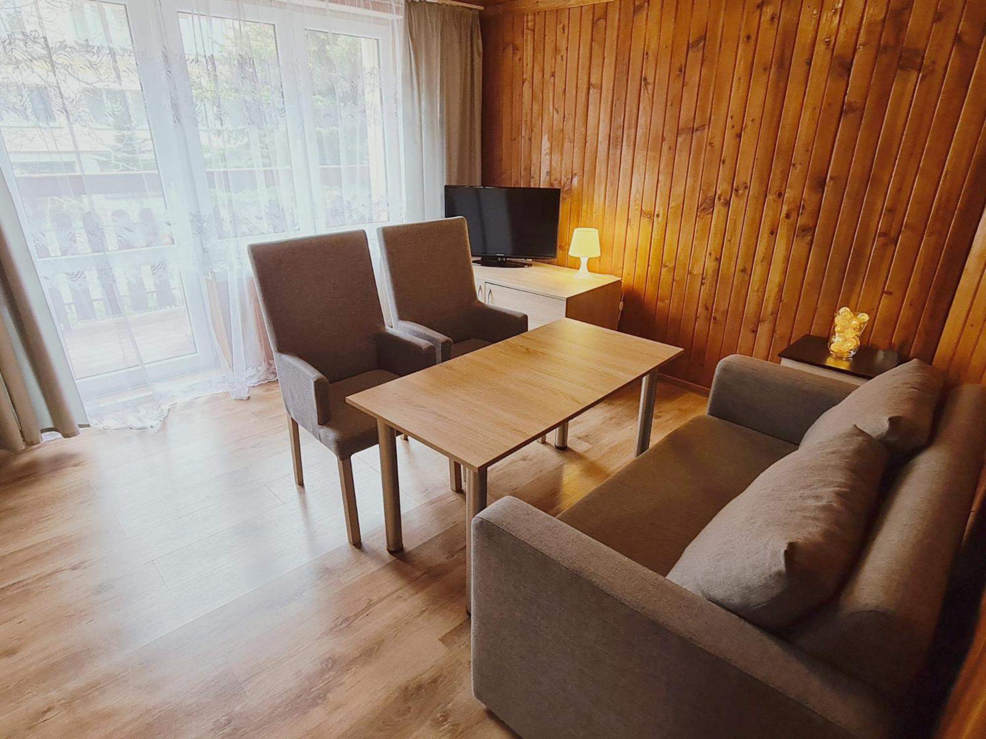 Apartment with Balcony - Photo 2