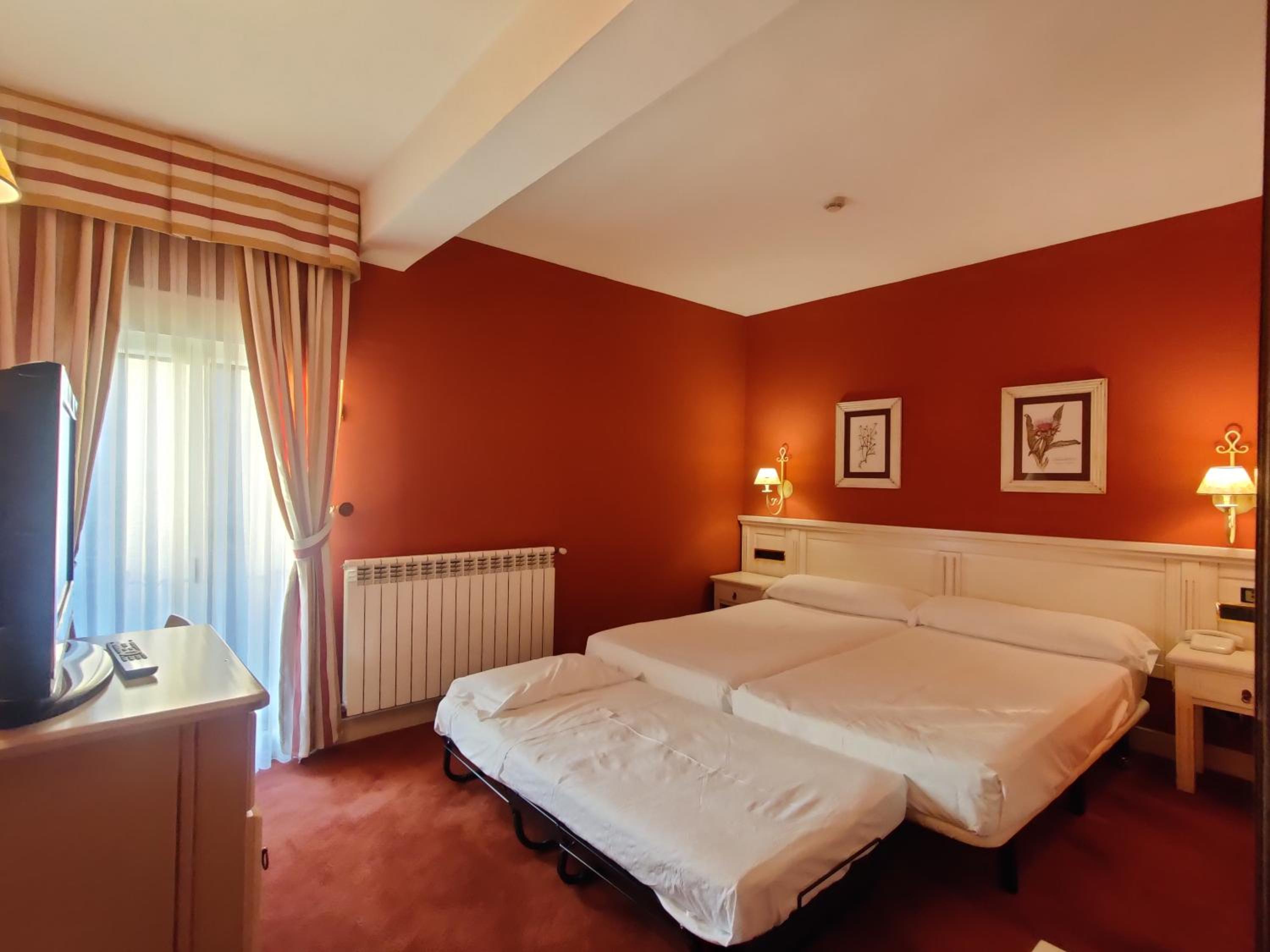 Habitación triple (2 adultos + 1 niño)