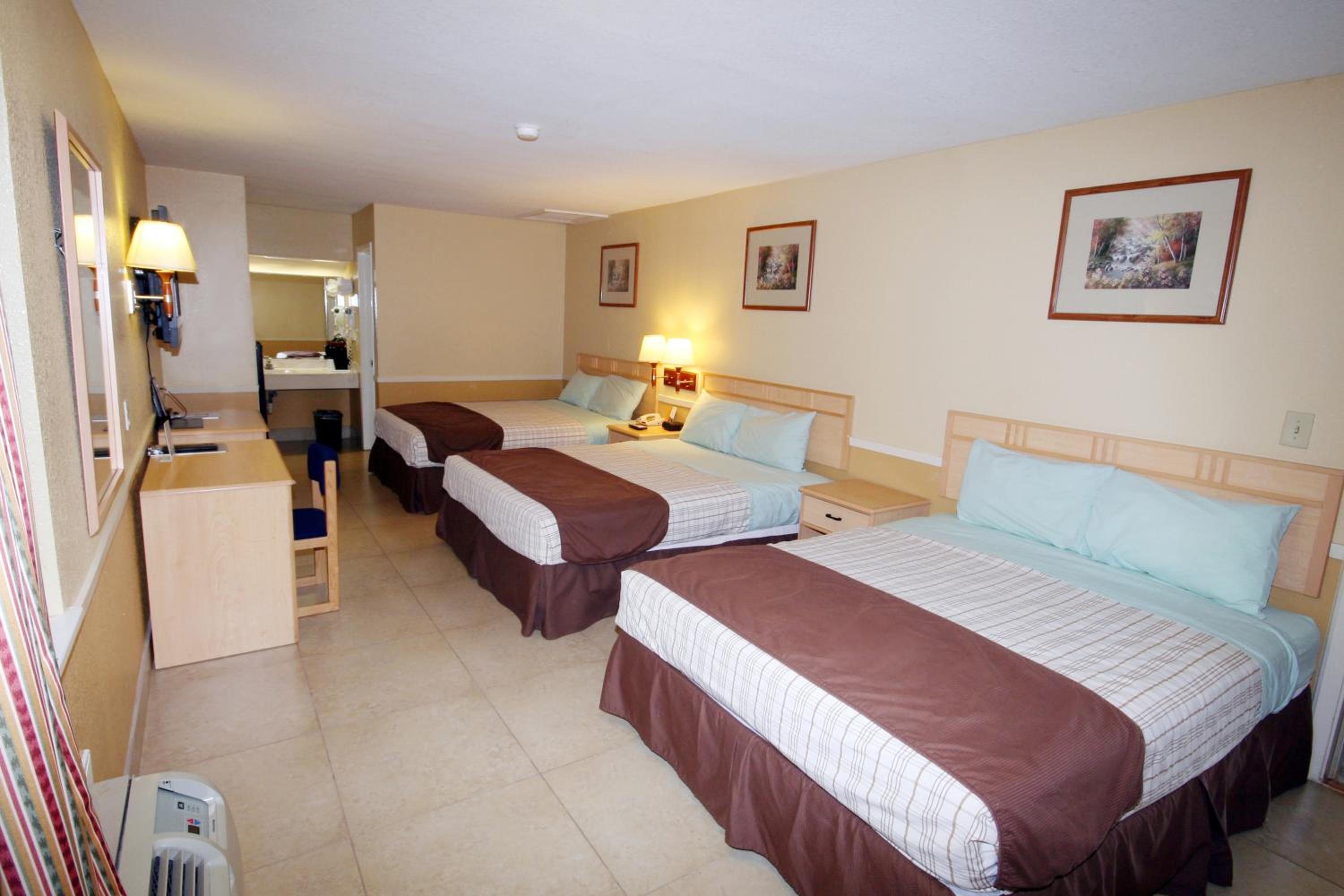 Queen Room with Three Queen Beds - Non-Smoking
