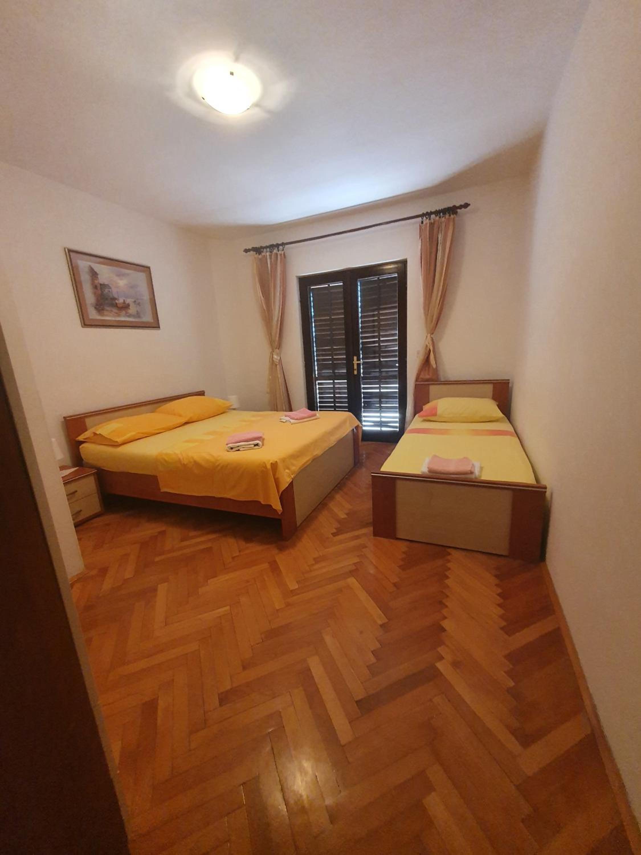 Three-Bedroom Apartment with Balcony and Sea View