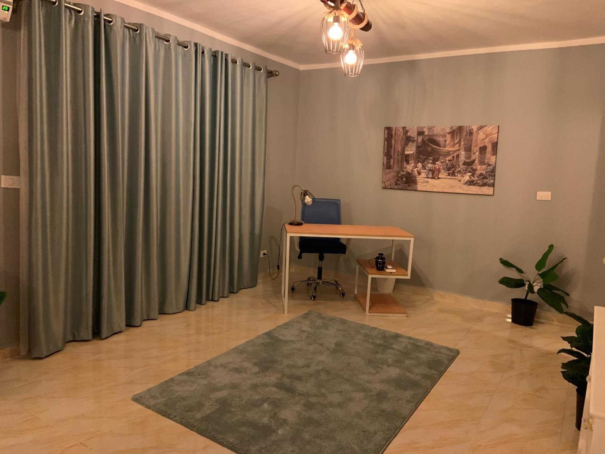 Three-Bedroom Apartment photo 2