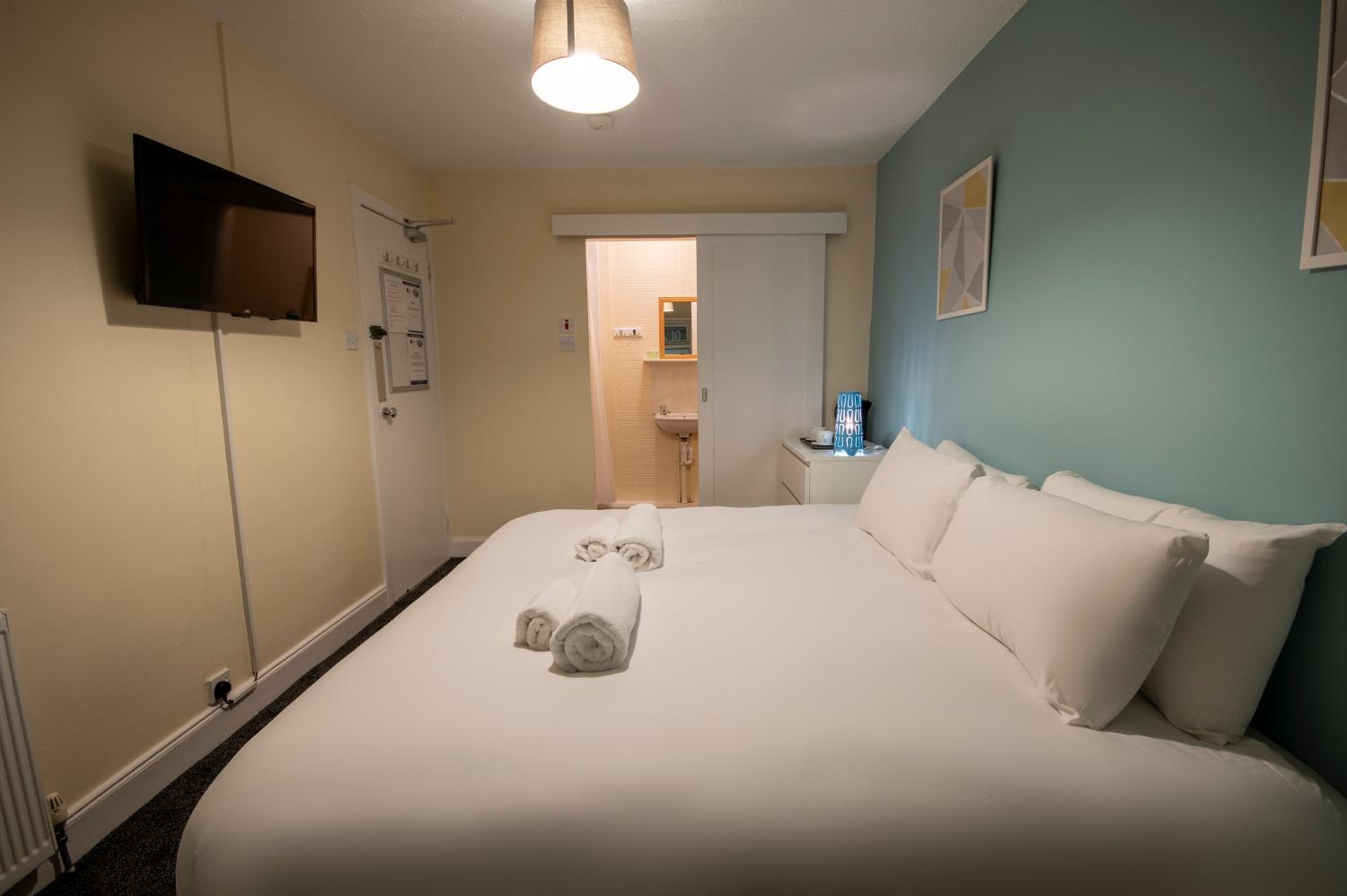 Queen Room with Shared Bathroom