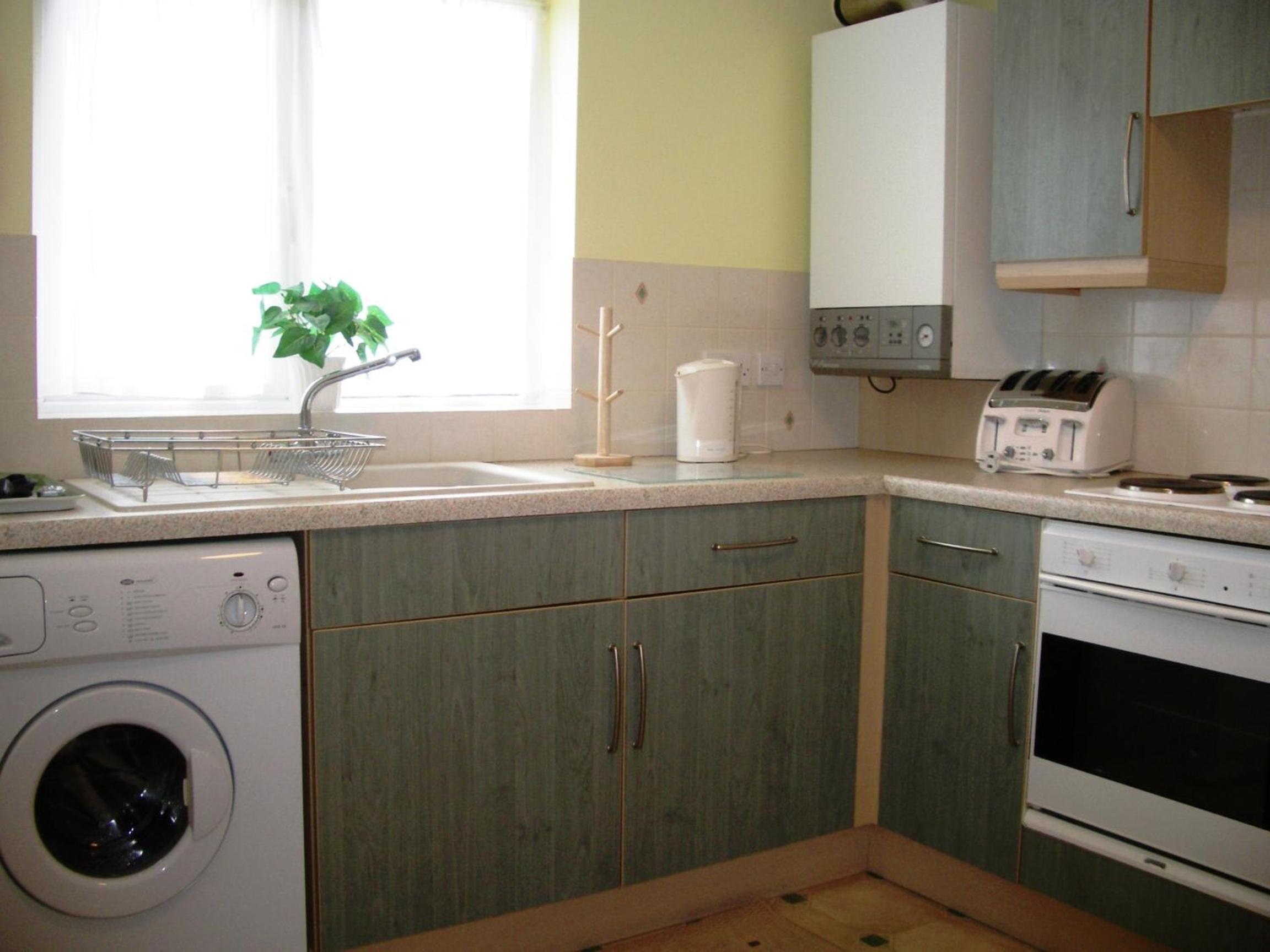 Three-Bedroom Apartment - Photo 4