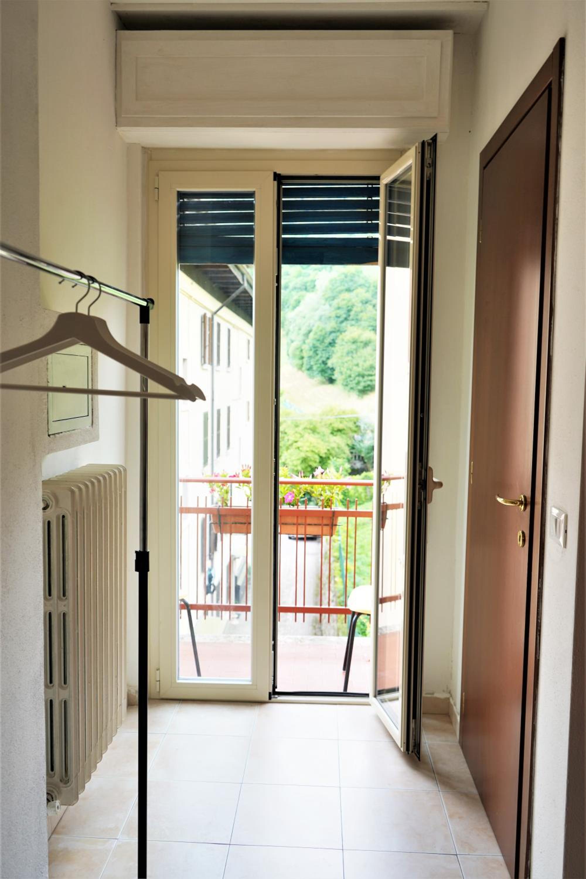 Family Room with Balcony - Photo 7
