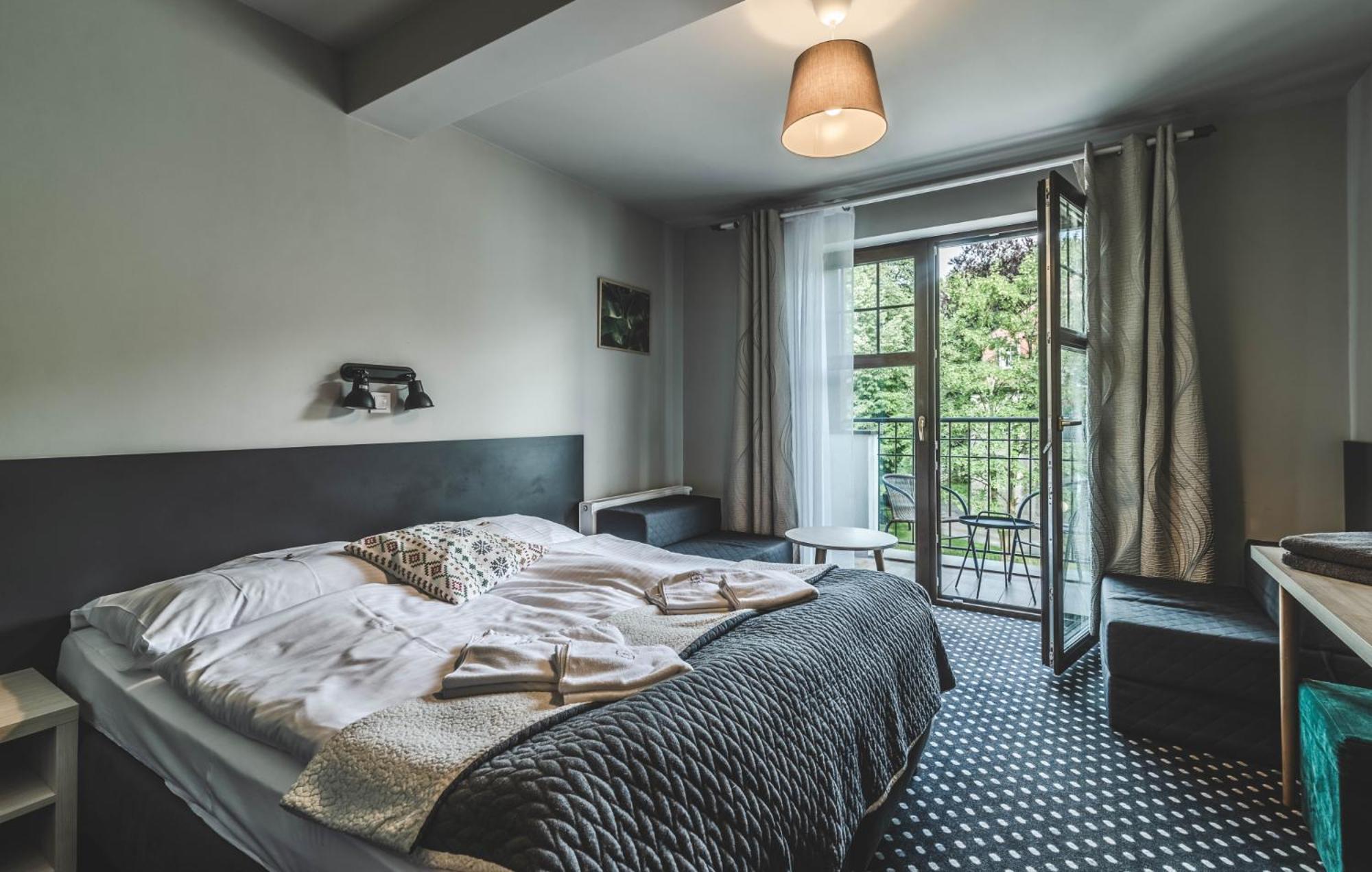 Deluxe Double Room with Balcony - Photo 1