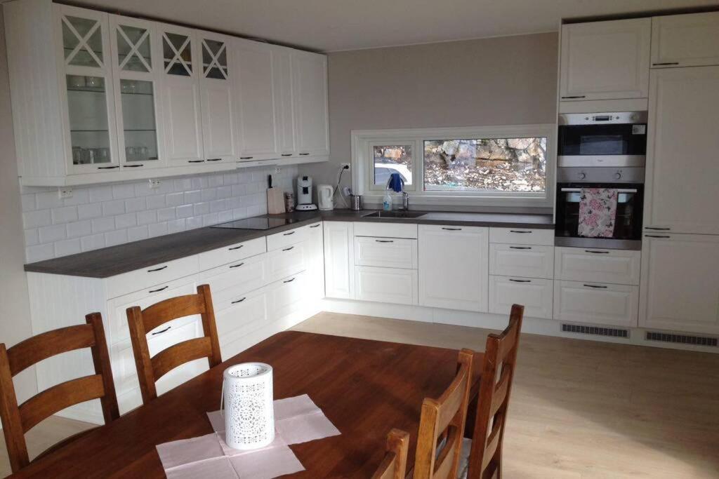 Four-Bedroom House - Photo 28