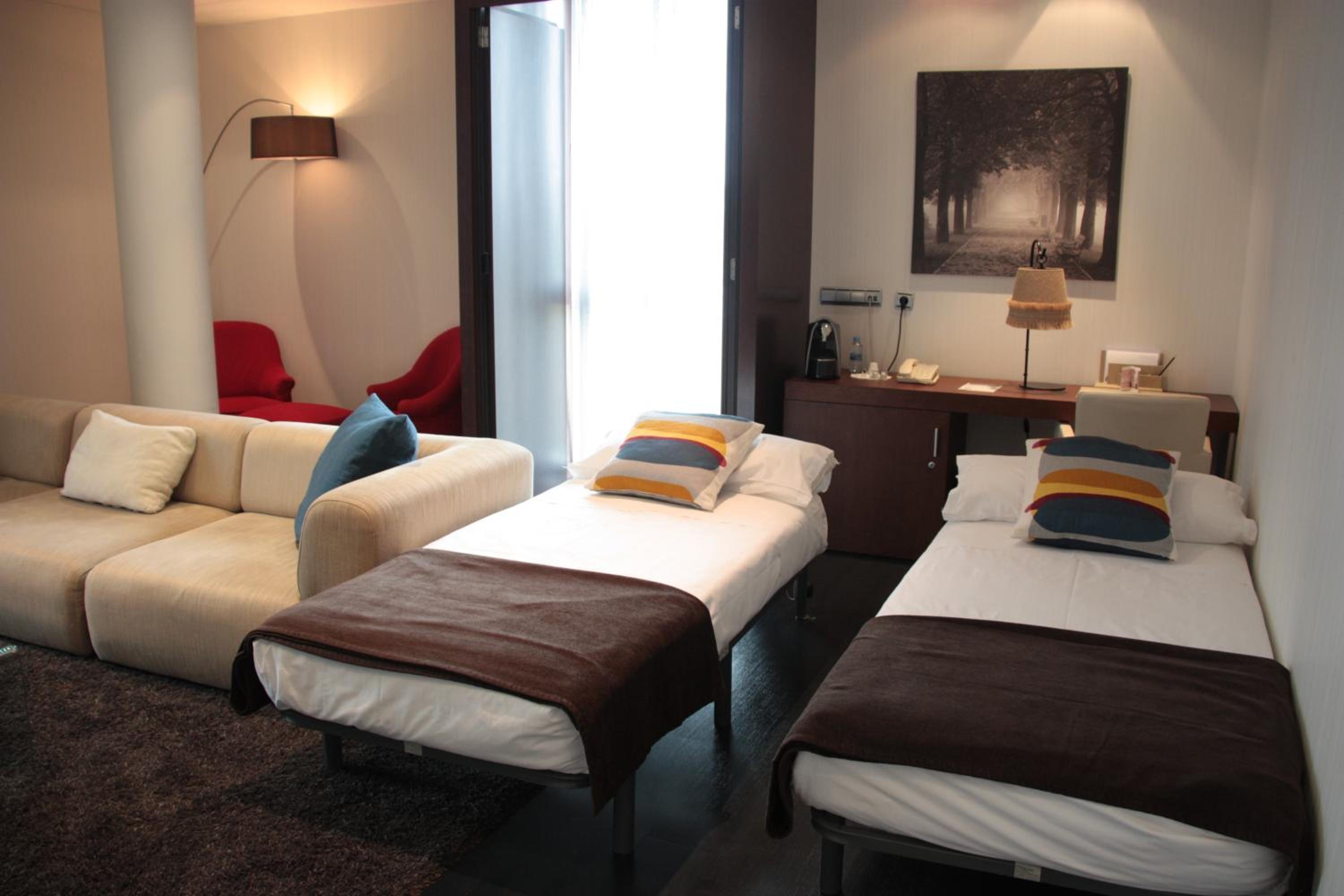 Quadruple Room (2 Adults + 2 Children)