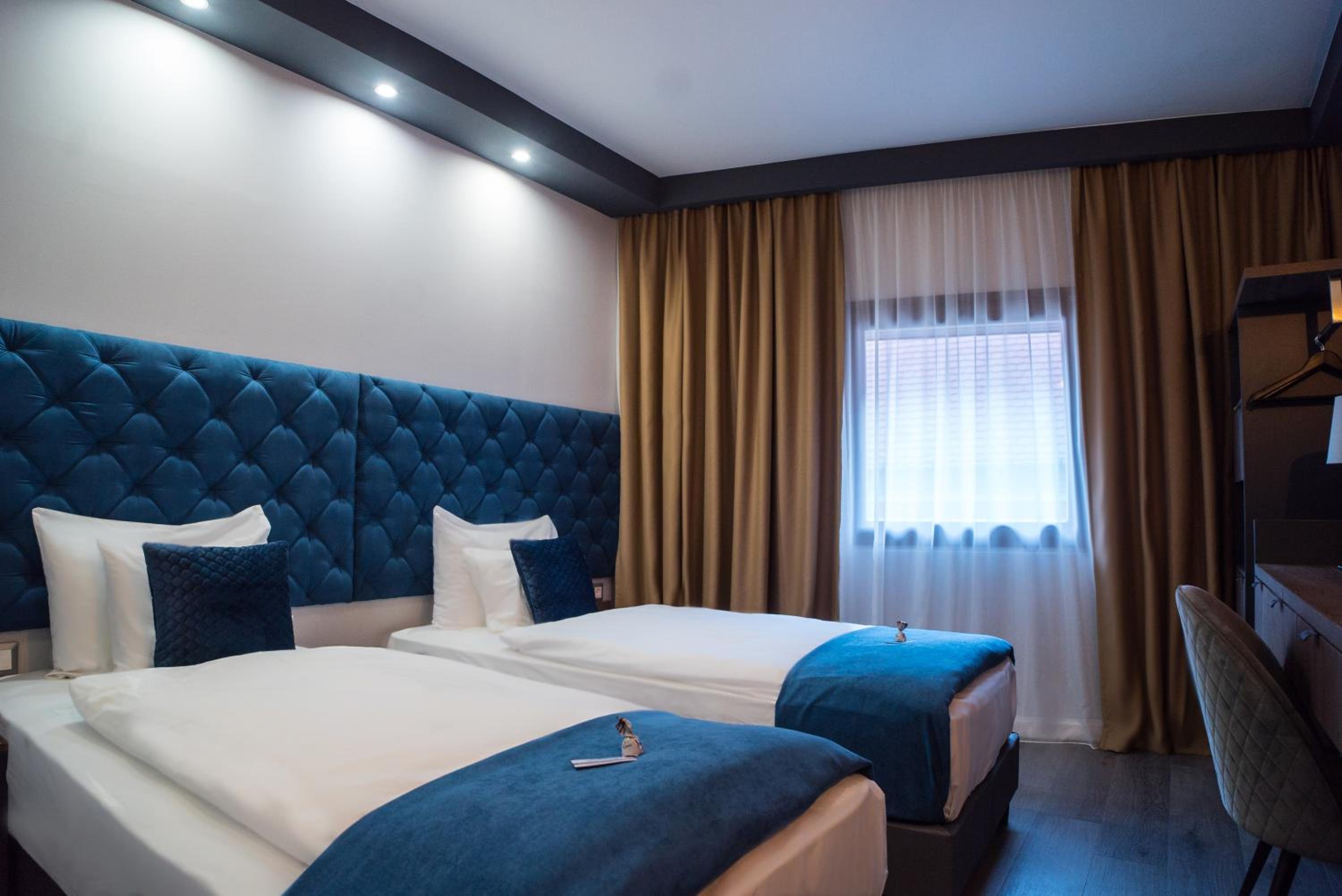 Twin Room - Photo 1
