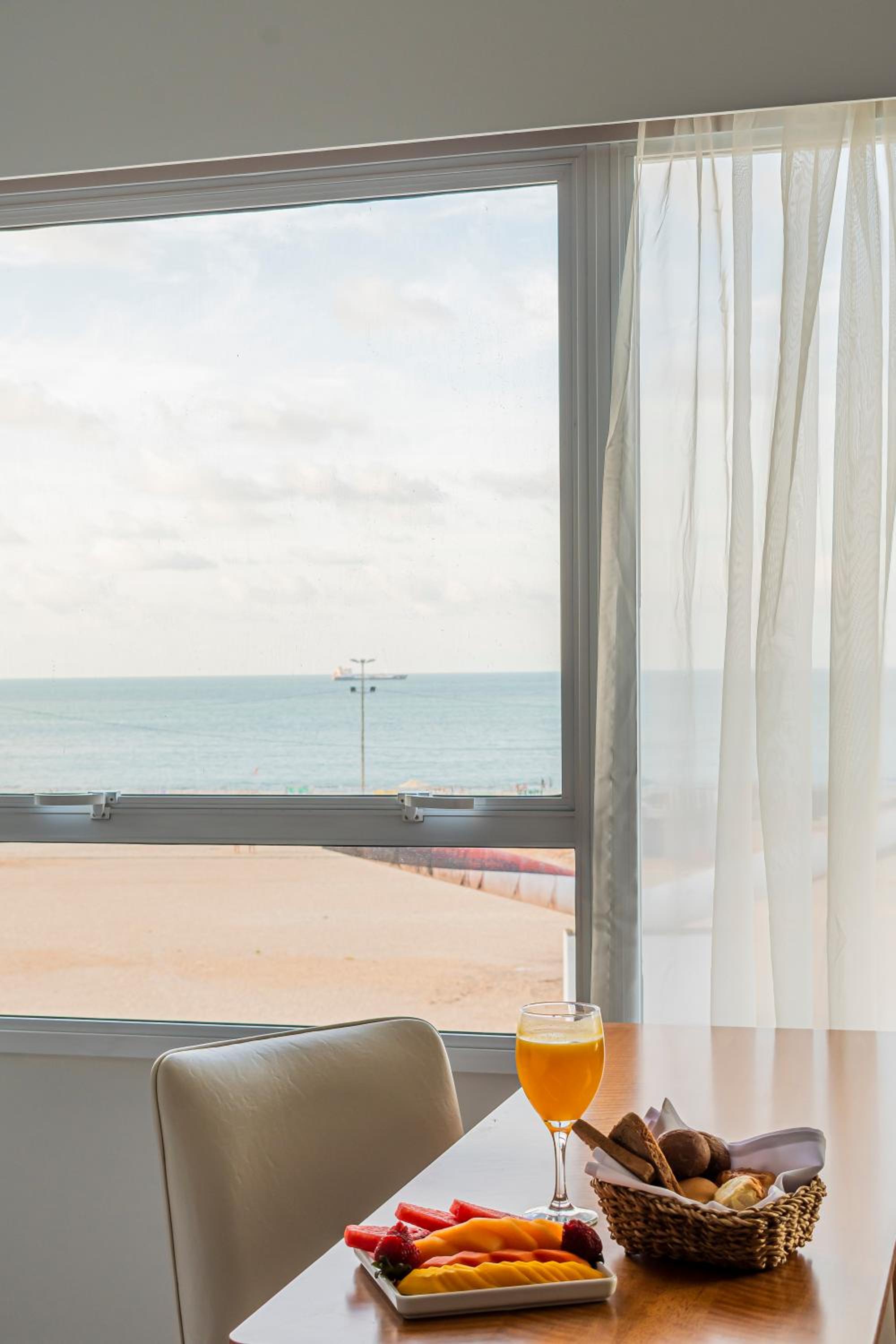 Quarto Triplo Superior casal vista mar