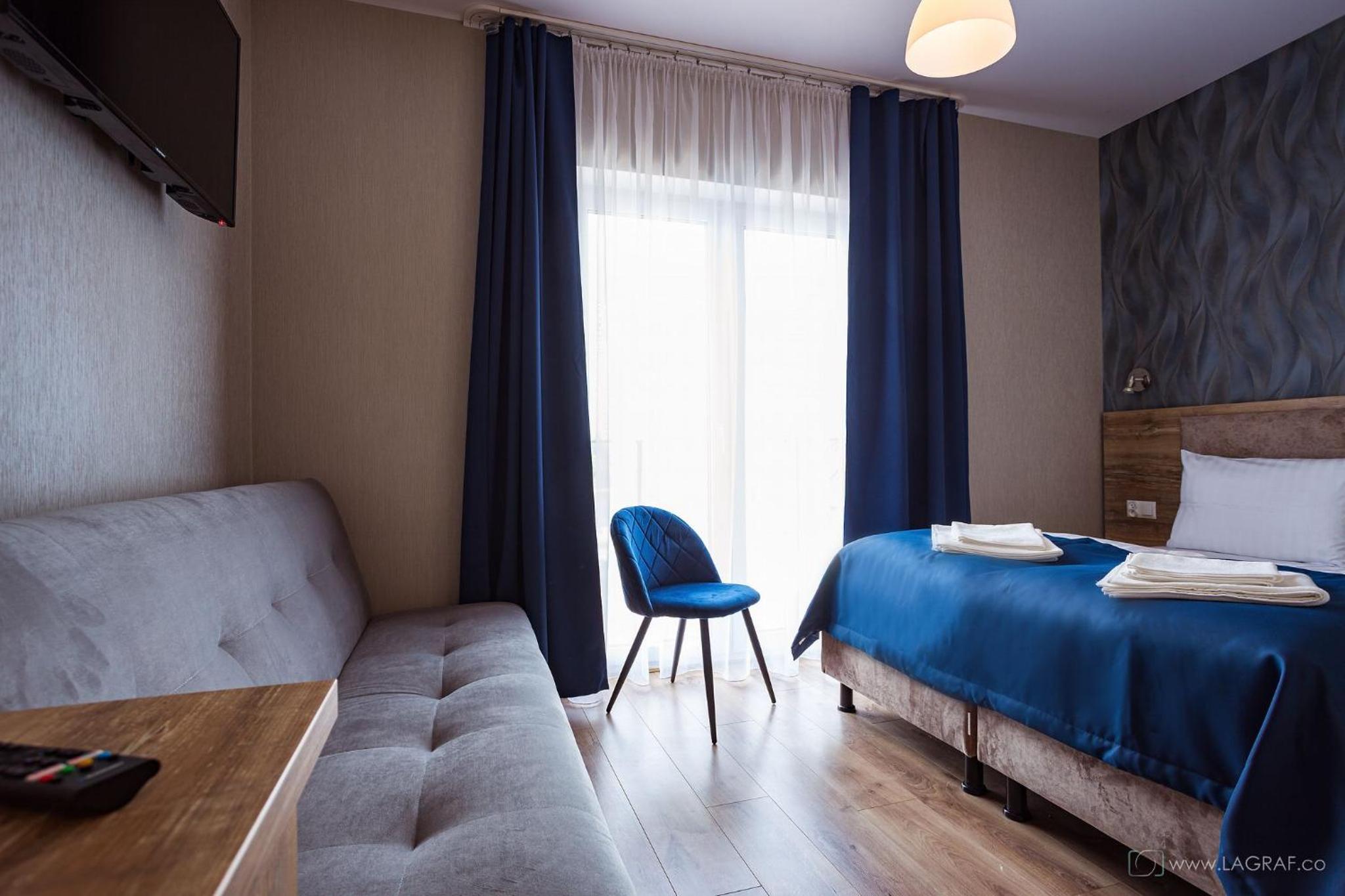 Deluxe Quadruple Room - Photo 1