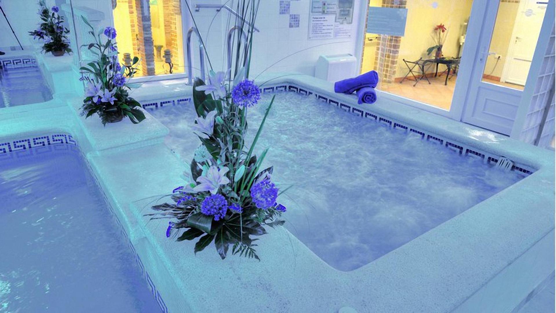 Habitación Doble con Cama Adicional con Acceso al Spa (2 Adultos + 1 Niño)