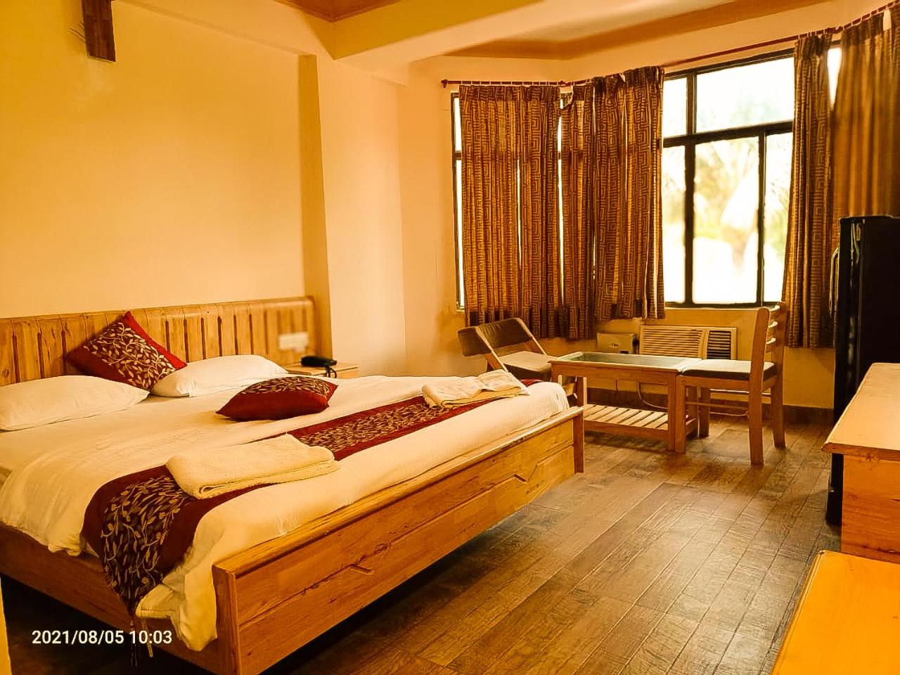 Deluxe Room - Photo 2