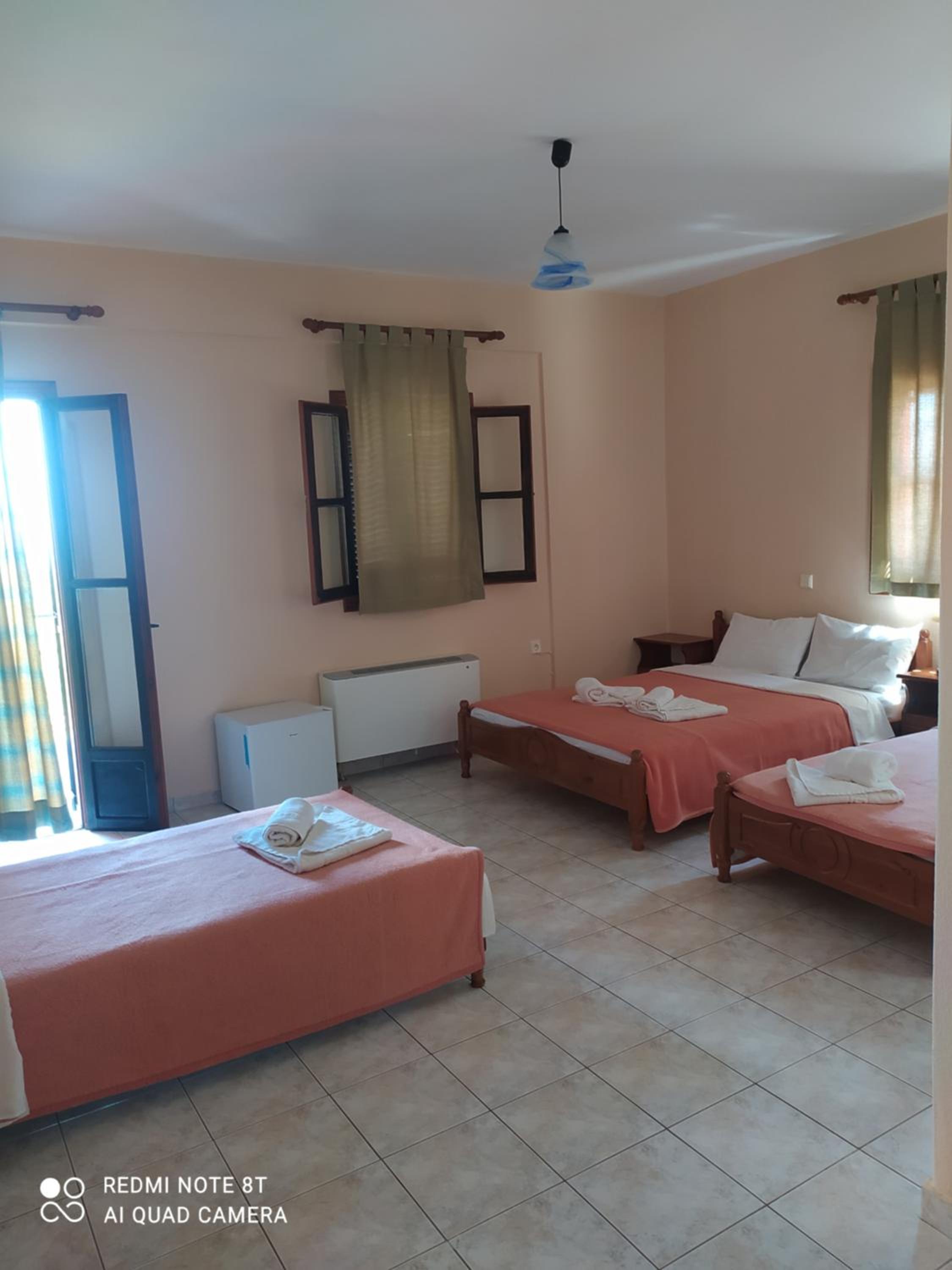 Quadruple Room with Private Bathroom - Photo 1