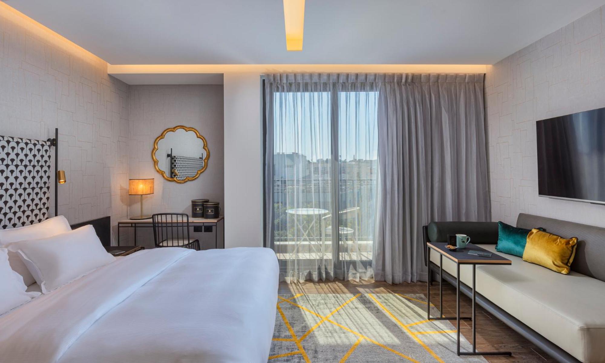 Deluxe Room with Balcony - Photo 1