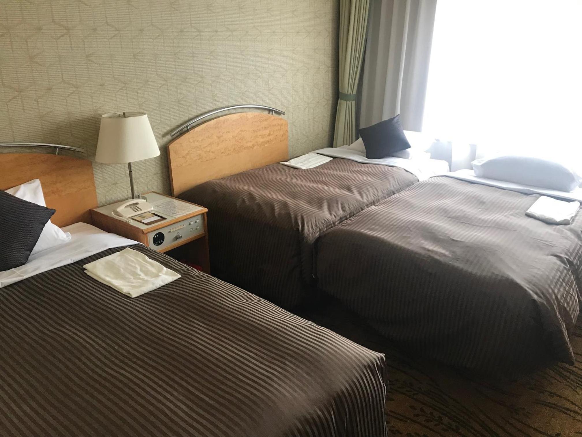 Standard Twin Room with Extrabed - Non-Smoking photo 1