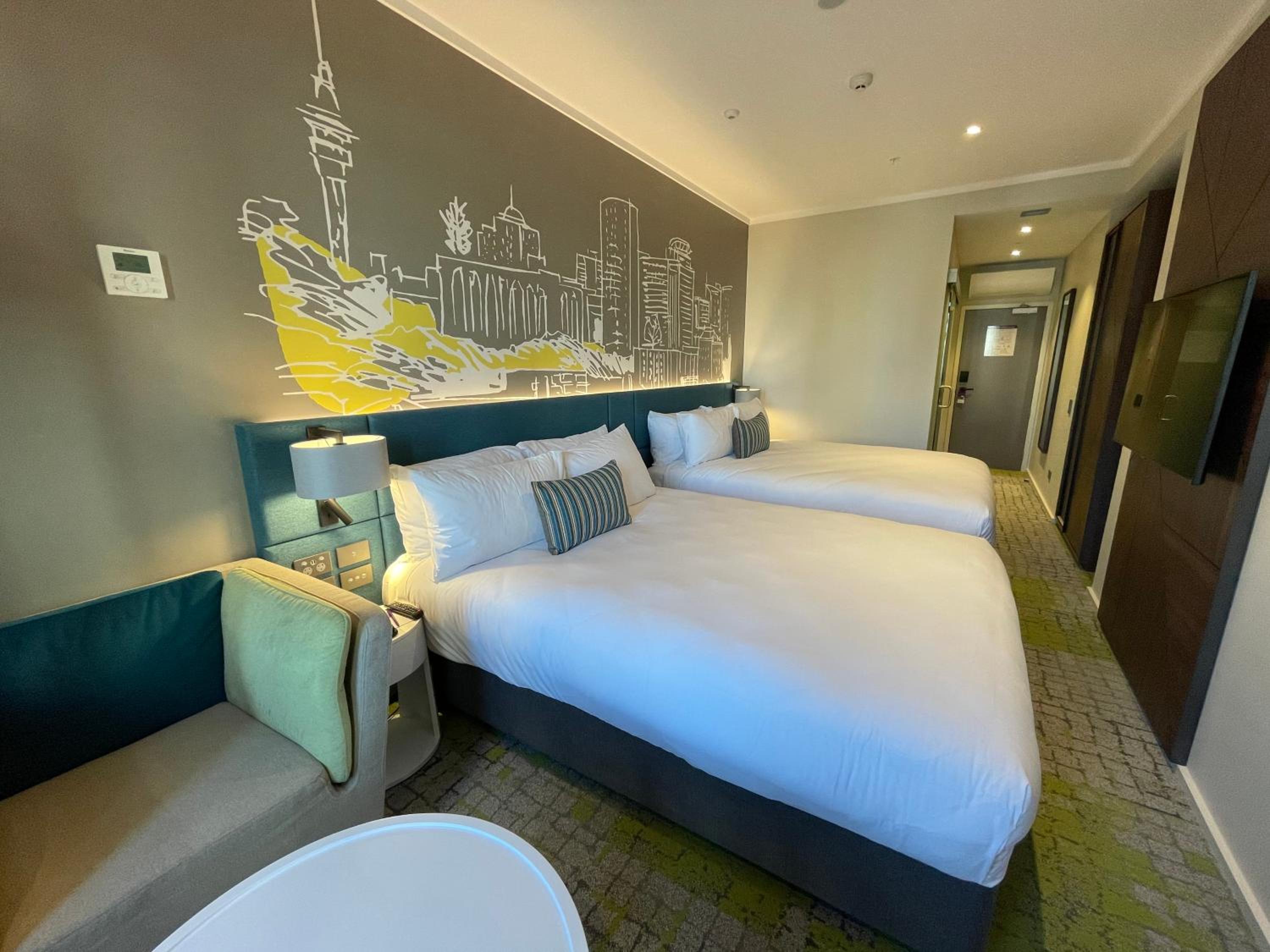 Standard Queen Room with Two Queen Beds - Photo 2